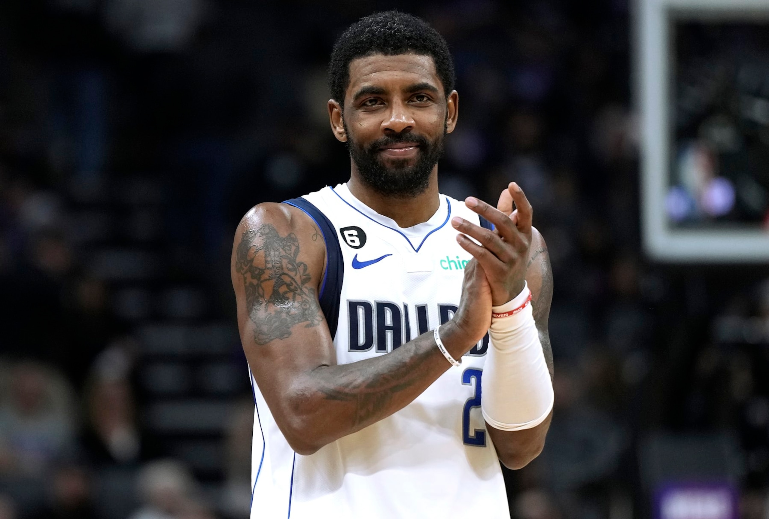 SACRAMENTO, CALIFORNIA - FEBRUARY 10: Kyrie Irving #2 of the Dallas Mavericks looks on clapping against the Sacramento Kings late in the fourth quarter at Golden 1 Center on February 10, 2023 in Sacramento, California. NOTE TO USER: User expressly acknowledges and agrees that, by downloading and or using this photograph, User is consenting to the terms and conditions of the Getty Images License Agreement. (Photo by Thearon W. Henderson/Getty Images)