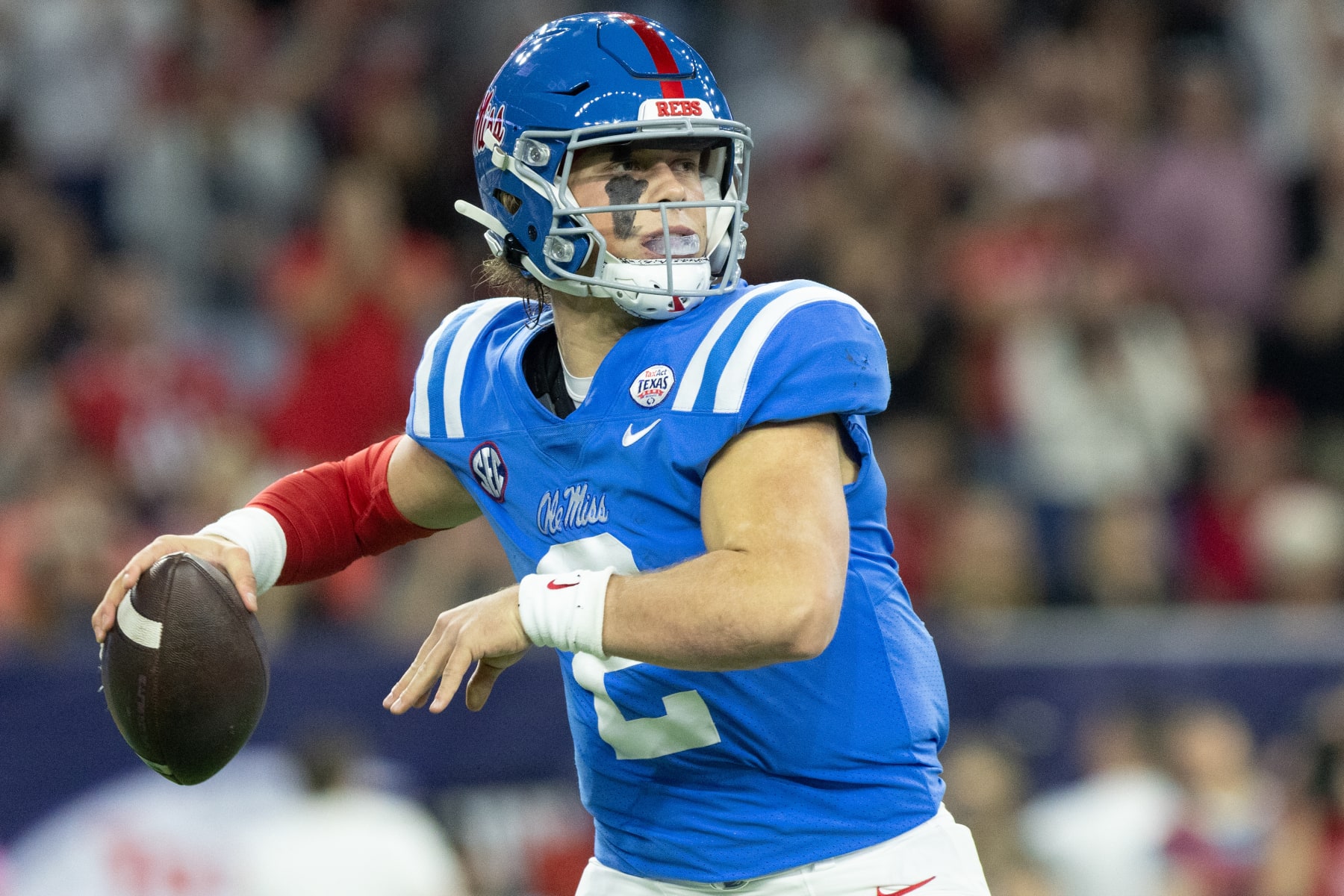 HOUSTON, TX - DECEMBER 28: Mississippi Rebels quarterback Jaxson Dart (2) prepares to throw the ball during the first half of the TaxAct Texas Bowl college football game game between the Texas Tech Red Raiders and the Ole Miss Rebels on December 28, 2022, at NRG Stadium in Houston, TX. (Logan Hannigan-Downs/Icon Sportswire via Getty Images)