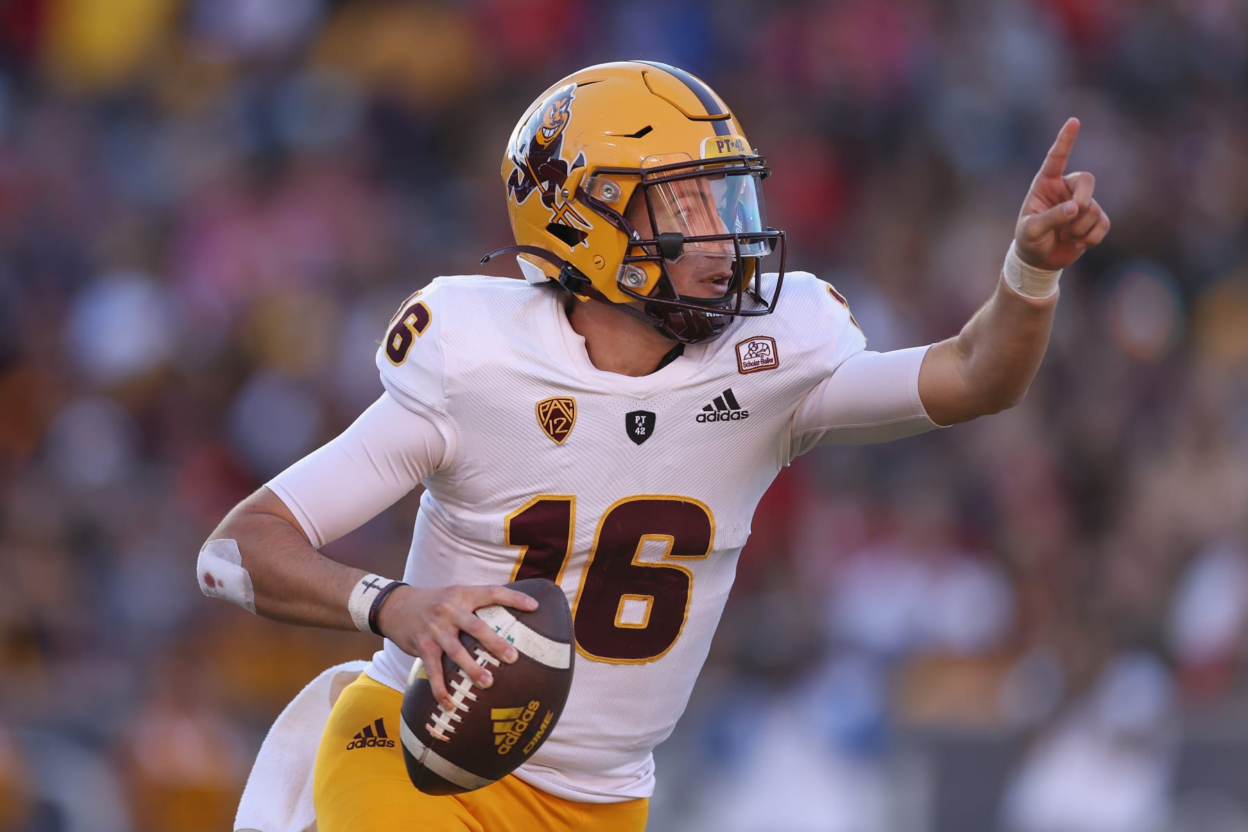 TUCSON, ARIZONA - NOVEMBER 25: Quarterback Trenton Bourguet #16 of the Arizona State Sun Devils looks to pass during the second half of the NCAAF game against the Arizona Wildcats at Arizona Stadium on November 25, 2022 in Tucson, Arizona. This year's game is the 96th annual Territorial Cup match between Arizona rival schools.  The Wildcats defeated the Sun Devils 38-35.  (Photo by Christian Petersen/Getty Images)