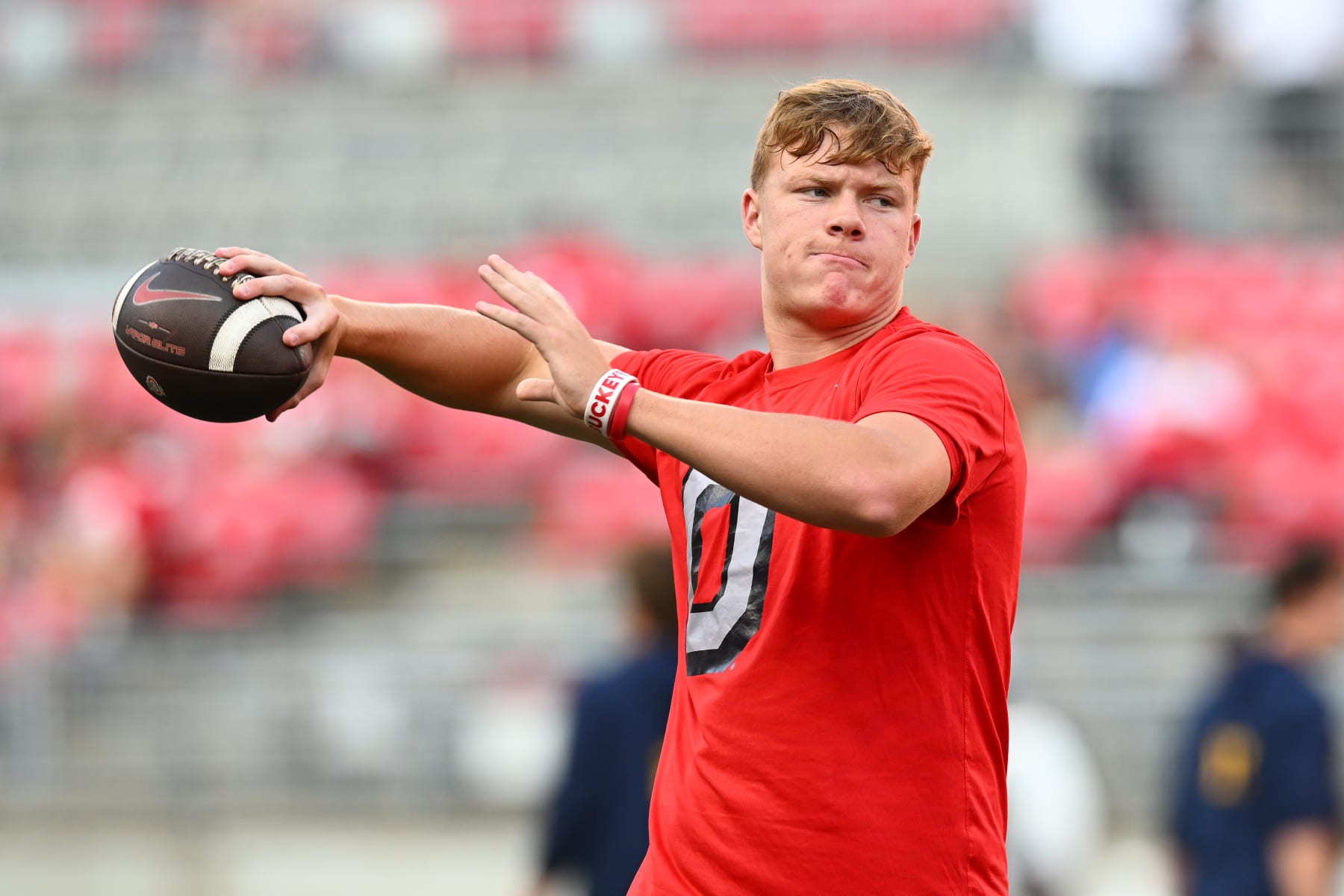 COLUMBUS, OHIO - SEPTEMBER 17: Devin Brown #15 of the Ohio State Buckeyes warms up prior to a game against the Toledo Rockets at Ohio Stadium on September 17, 2022 in Columbus, Ohio. (Photo by Ben Jackson/Getty Images)