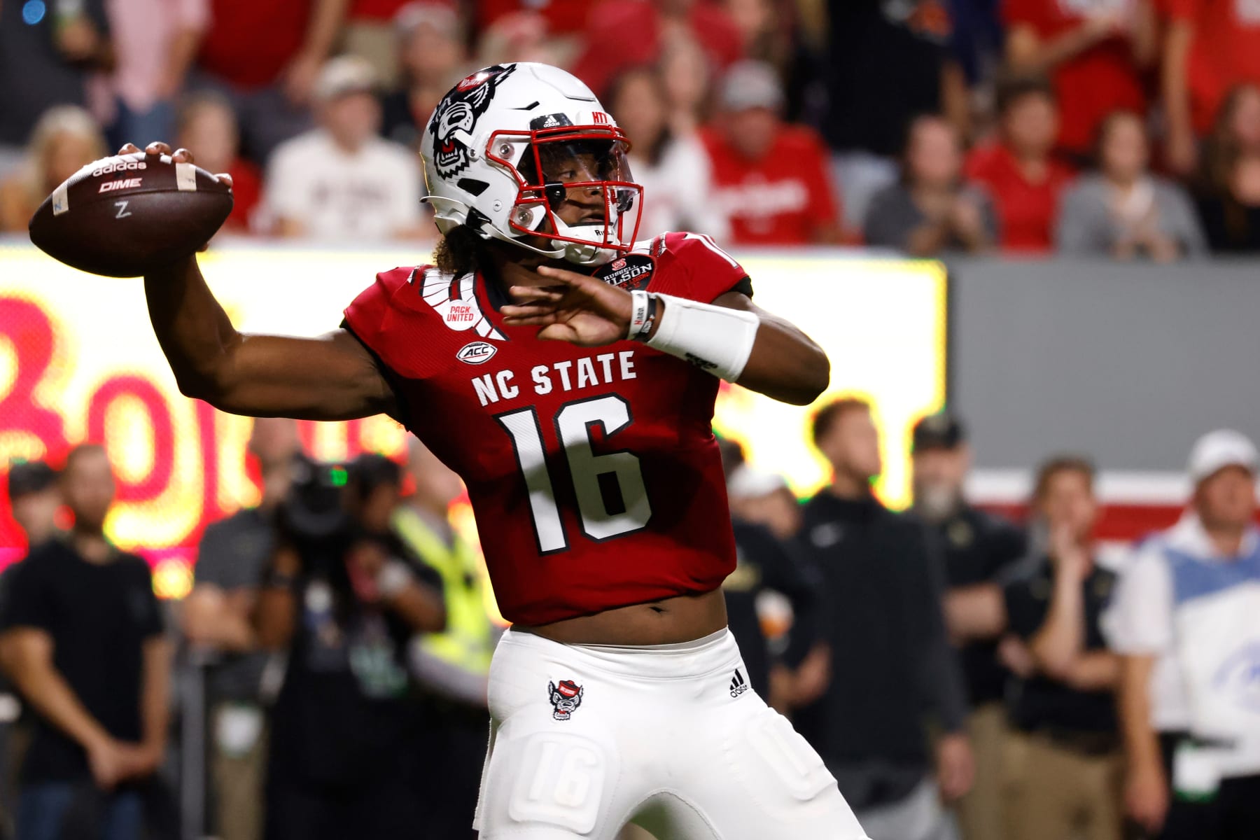 RALEIGH, NC - NOVEMBER 05: MJ Morris #16 of the North Carolina State Wolfpack drops back to pass against the Wake Forest Demon Deacons during the first half at Carter-Finley Stadium on November 5, 2022 in Raleigh, North Carolina. (Photo by Lance King/Getty Images)