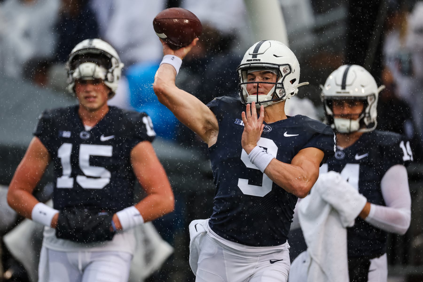 STATE COLLEGE, PA - OCTOBER 01: Beau Pribula #9 of the Penn State Nittany Lions warms up as Drew Allar #15 and Sean Clifford #14 look on before the game against the Northwestern Wildcats at Beaver Stadium on October 1, 2022 in State College, Pennsylvania. (Photo by Scott Taetsch/Getty Images)