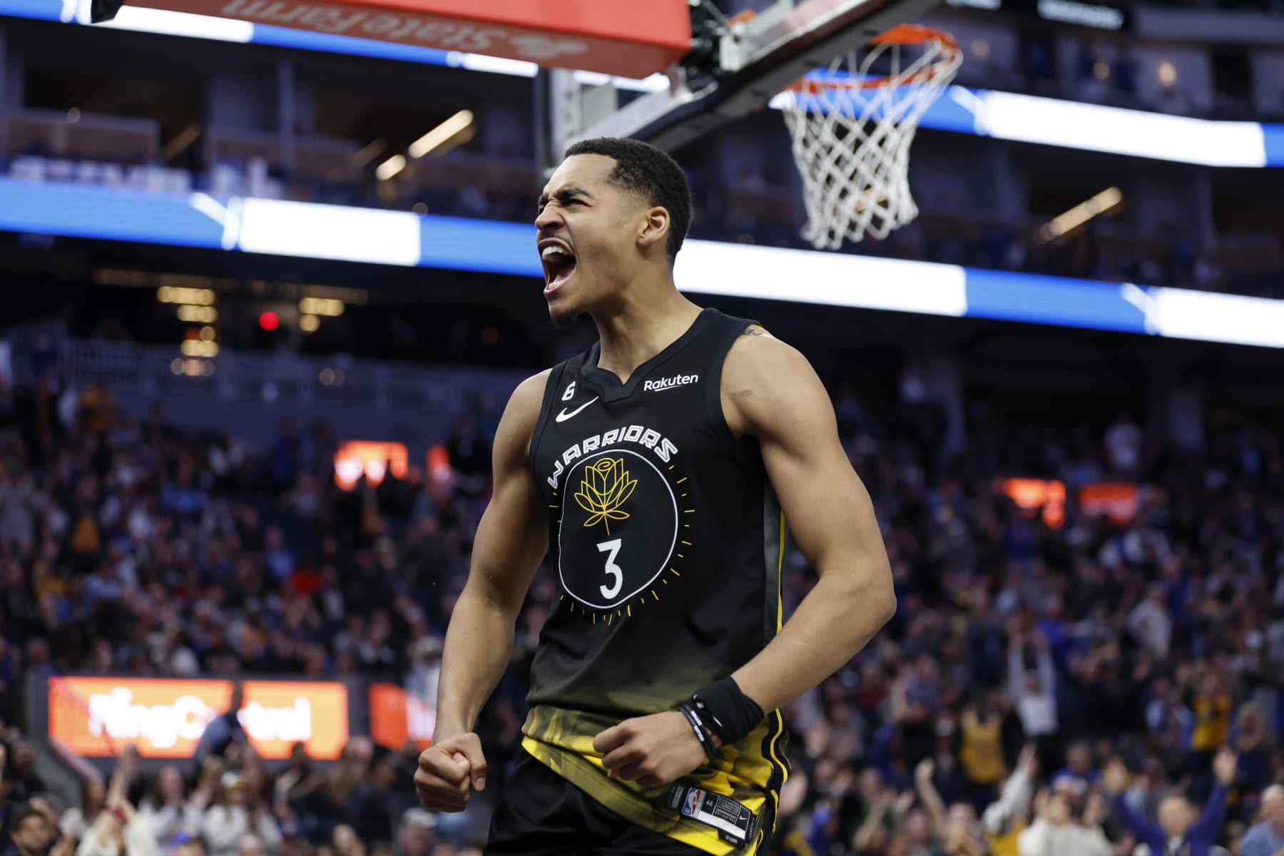 Golden State Warriors guard Jordan Poole (3) celebrates after scoring against the Los Angeles Lakers during the second half of an NBA basketball game in San Francisco, Saturday, Feb. 11, 2023. (AP Photo/Jed Jacobsohn)