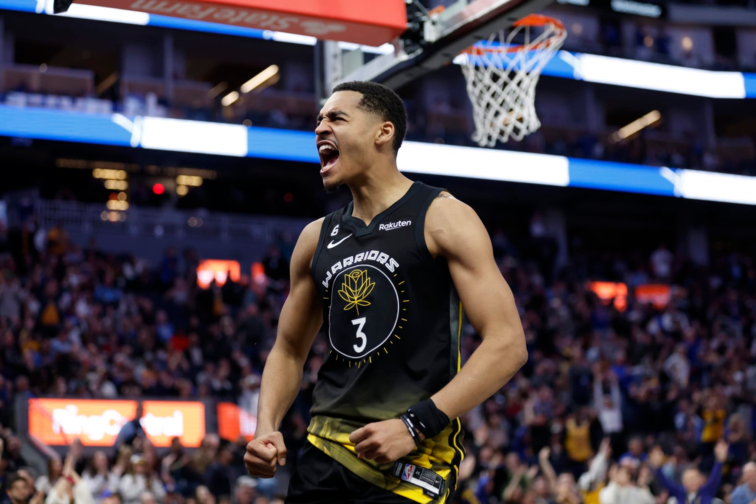 Golden State Warriors guard Jordan Poole (3) celebrates after scoring against the Los Angeles Lakers during the second half of an NBA basketball game in San Francisco, Saturday, Feb. 11, 2023. (AP Photo/Jed Jacobsohn)