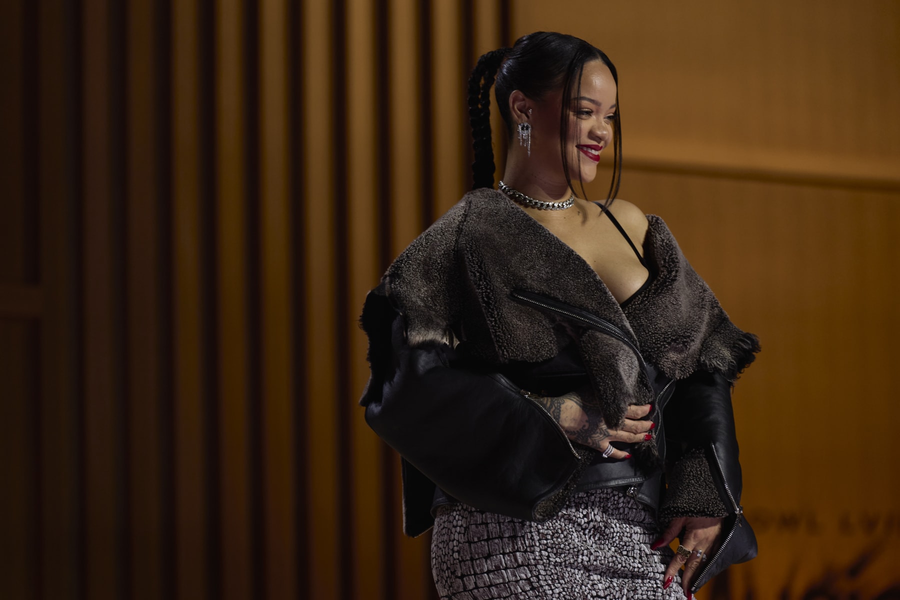 PHOENIX, AZ - FEBRUARY 09: Rihanna poses for a photo during a press conference for the Apple Music Super Bowl 57 halftime show at the Phoenix Convention Center on February 9, 2023 in Phoenix, Arizona. (Photo by Cooper Neill/Getty Images)