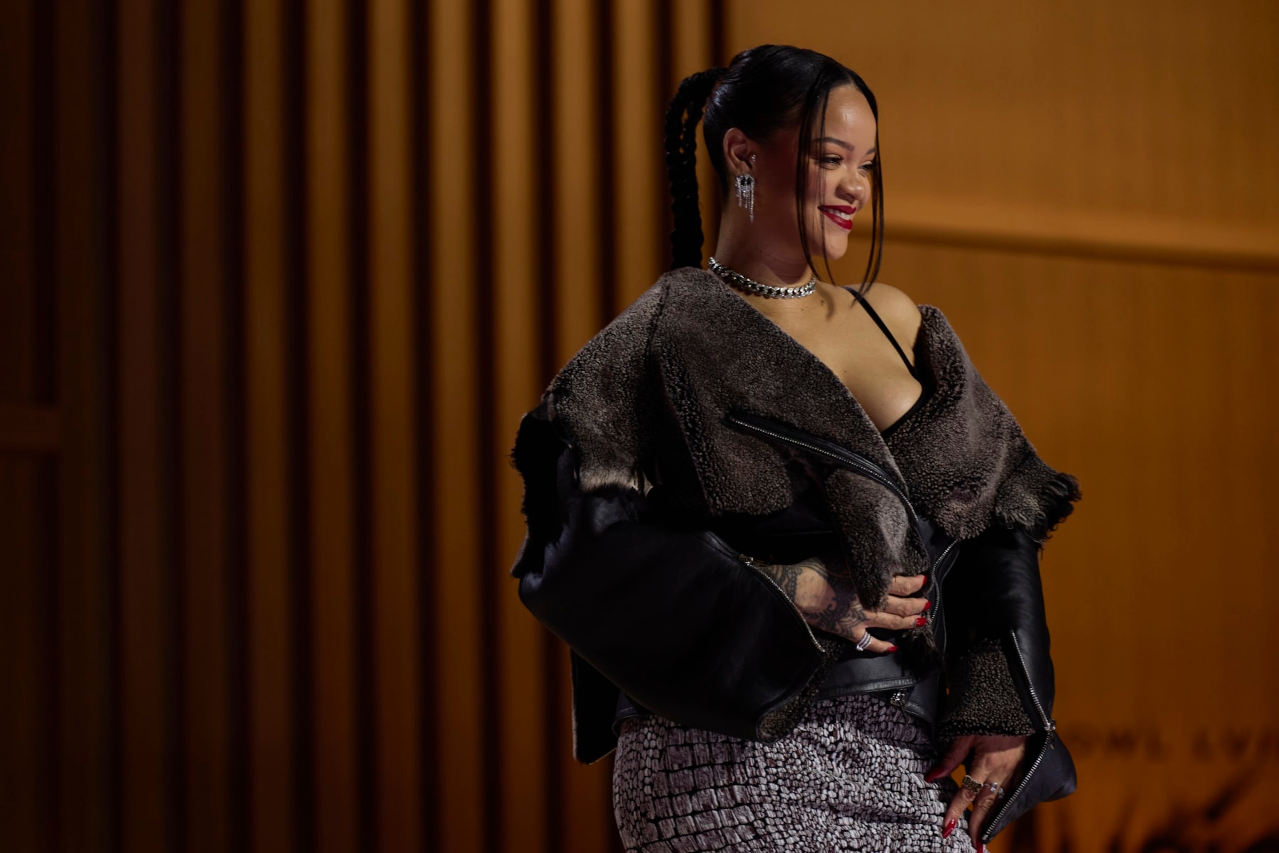 PHOENIX, AZ - FEBRUARY 09: Rihanna poses for a photo during a press conference for the Apple Music Super Bowl 57 halftime show at the Phoenix Convention Center on February 9, 2023 in Phoenix, Arizona. (Photo by Cooper Neill/Getty Images)