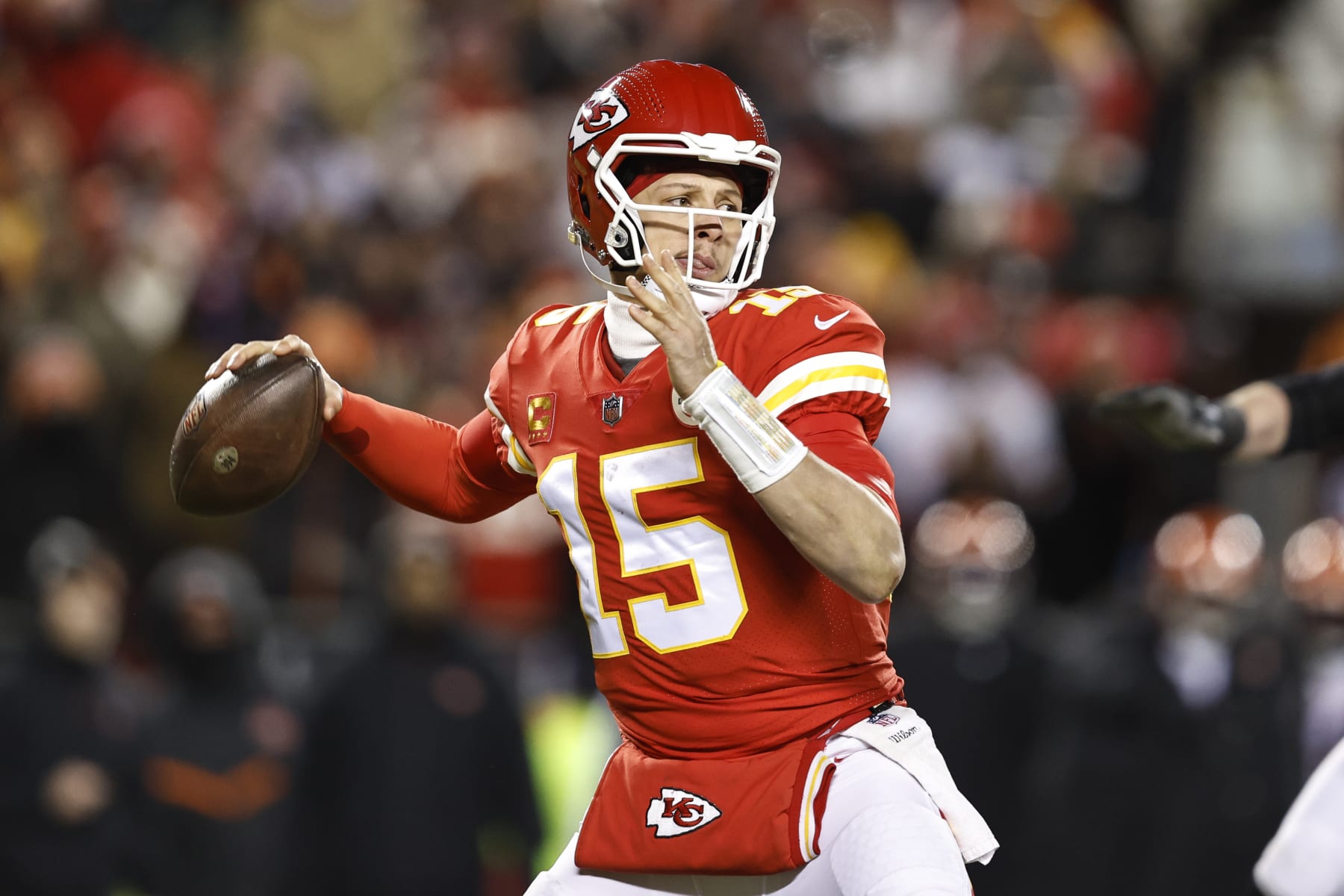KANSAS CITY, MISSOURI - JANUARY 29: Patrick Mahomes #15 of the Kansas City Chiefs passes the ball during the AFC Championship NFL football game between the Kansas City Chiefs and the Cincinnati Bengals at GEHA Field at Arrowhead Stadium on January 29, 2023 in Kansas City, Missouri. (Photo by Michael Owens/Getty Images)