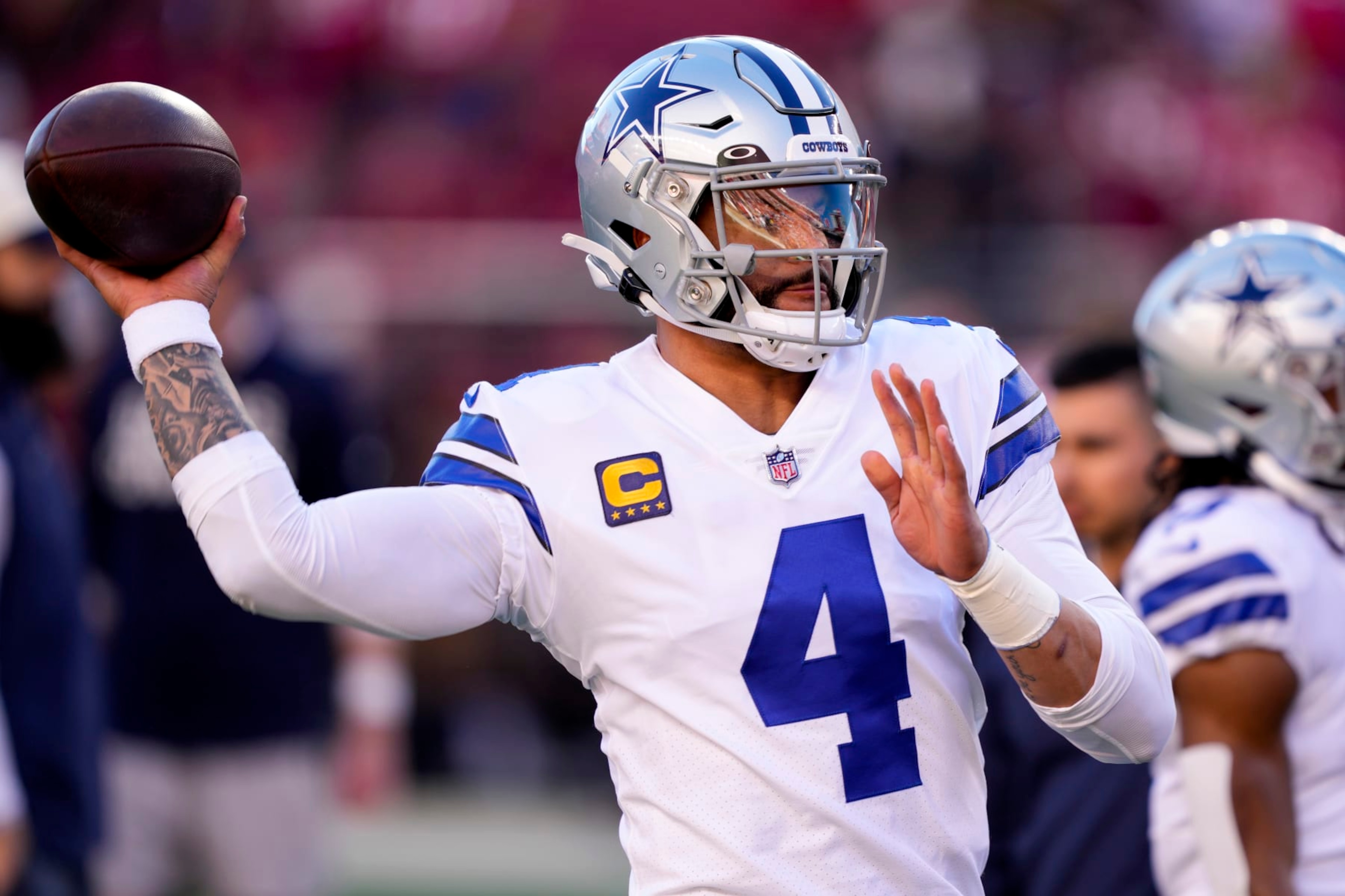 SANTA CLARA, CALIFORNIA - JANUARY 22: Dak Prescott #4 of the Dallas Cowboys warms up prior to a game against the San Francisco 49ers in the NFC Divisional Playoff game at Levi's Stadium on January 22, 2023 in Santa Clara, California. (Photo by Thearon W. Henderson/Getty Images) SANTA CLARA, CALIFORNIA - JANUARY 22: Dak Prescott #4 of the Dallas Cowboys warms up prior to a game against the San Francisco 49ers in the NFC Divisional Playoff game at Levi's Stadium on January 22, 2023 in Santa Clara, California. (Photo by Thearon W. Henderson/Getty Images)