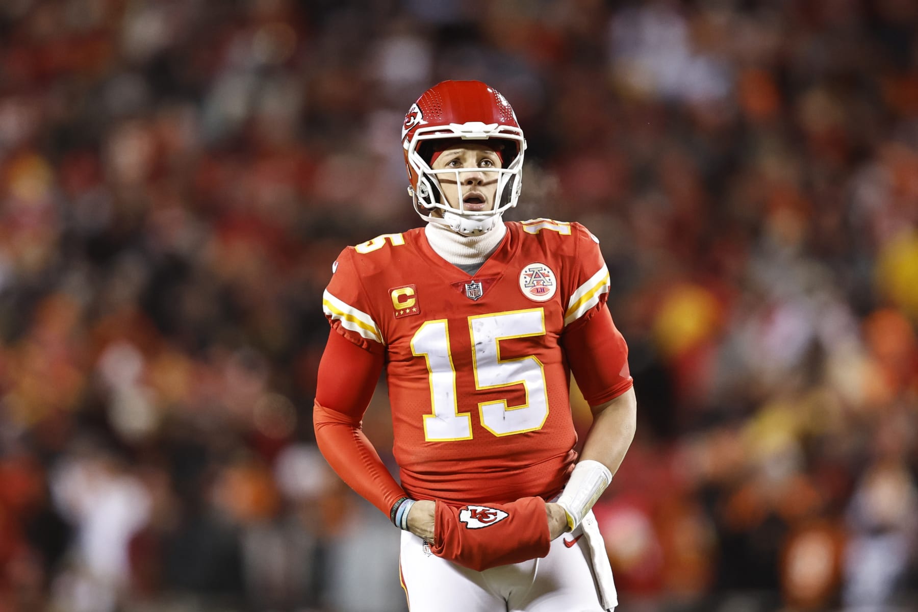 KANSAS CITY, MISSOURI - JANUARY 29: Patrick Mahomes #15 of the Kansas City Chiefs reacts as he looks on during the AFC Championship NFL football game between the Kansas City Chiefs and the Cincinnati Bengals at GEHA Field at Arrowhead Stadium on January 29, 2023 in Kansas City, Missouri. (Photo by Michael Owens/Getty Images)