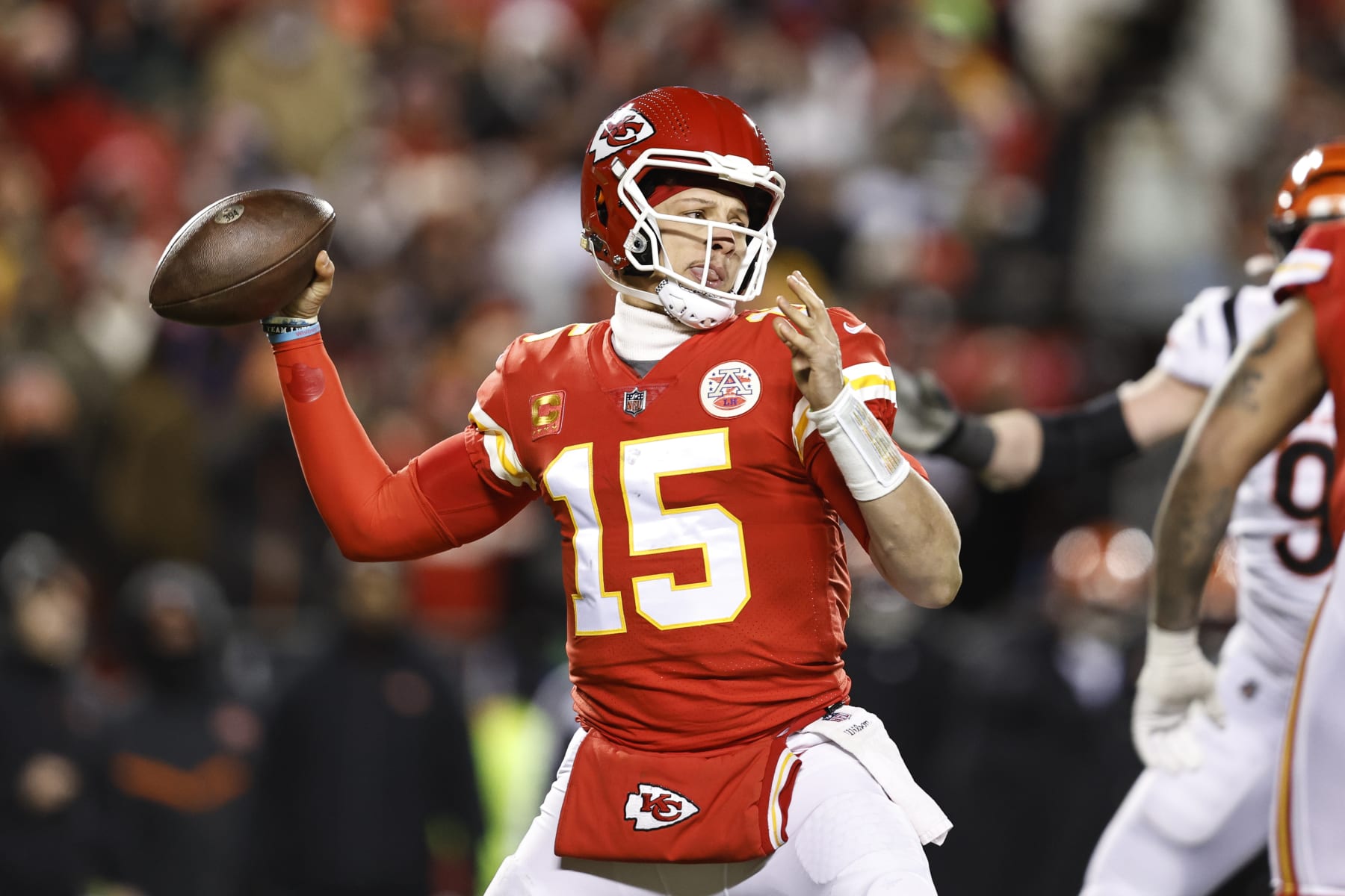 KANSAS CITY, MISSOURI - JANUARY 29: Patrick Mahomes #15 of the Kansas City Chiefs passes the ball during the AFC Championship NFL football game between the Kansas City Chiefs and the Cincinnati Bengals at GEHA Field at Arrowhead Stadium on January 29, 2023 in Kansas City, Missouri. (Photo by Michael Owens/Getty Images)