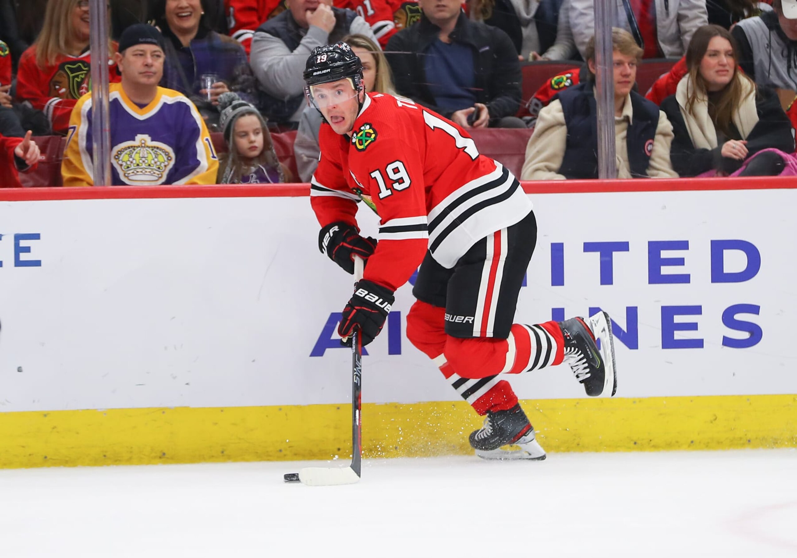 CHICAGO, IL - JANUARY 22: Chicago Blackhawks Center Jonathan Toews (19) controls the puck during a game between the Los Angeles Kings and the Chicago Blackhawks on January 22, 2023 at the United Center in Chicago, IL. (Photo by Melissa Tamez/Icon Sportswire via Getty Images)