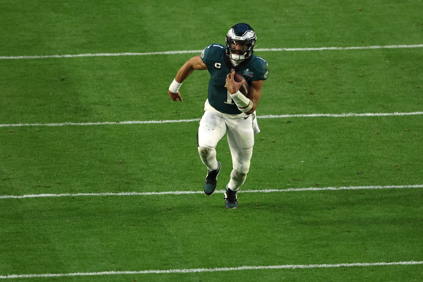 GLENDALE, ARIZONA - FEBRUARY 12: Jalen Hurts #1 of the Philadelphia Eagles runs the ball during the second quarter against the Kansas City Chiefs in Super Bowl LVII at State Farm Stadium on February 12, 2023 in Glendale, Arizona. (Photo by Sean M. Haffey/Getty Images)