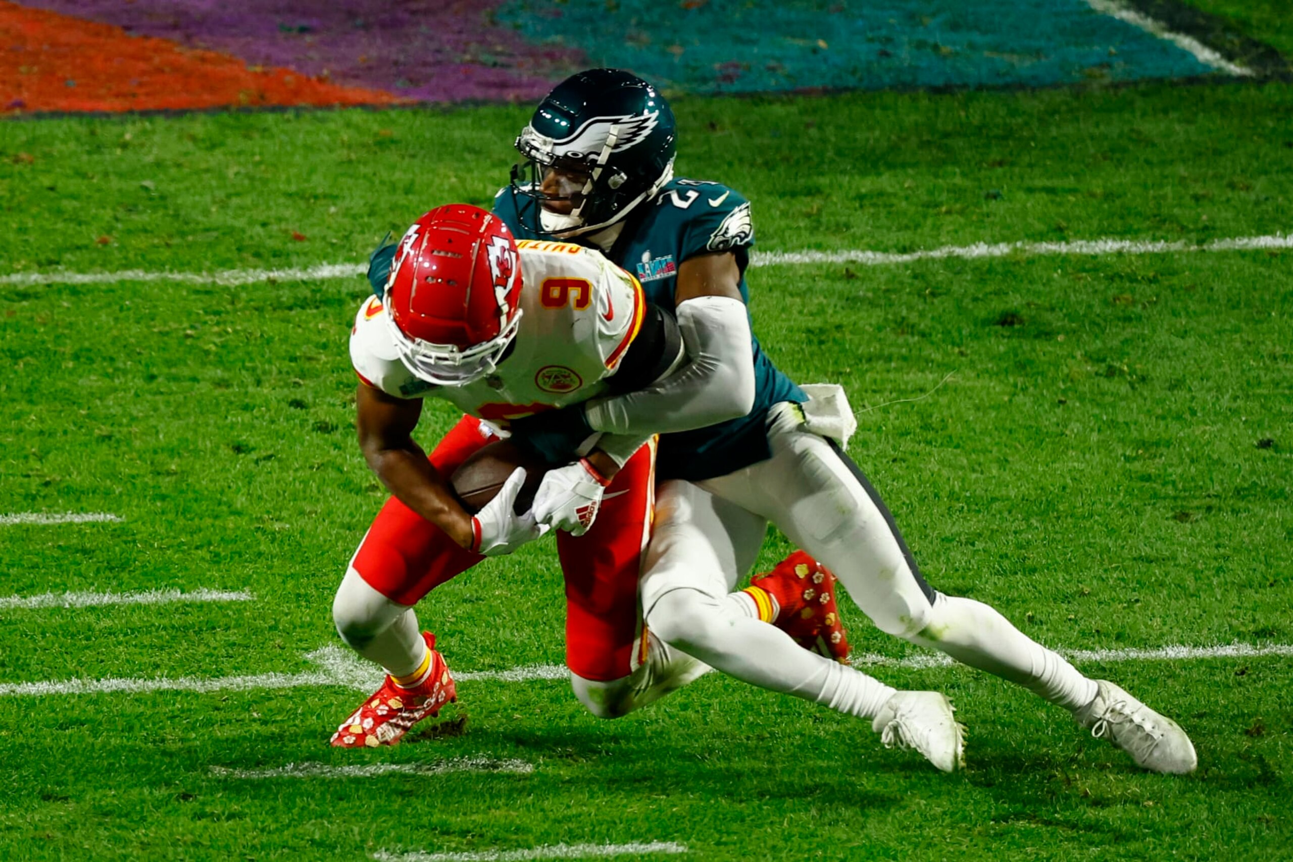 GLENDALE, AZ - FEBRUARY 12: James Bradberry #24 of the Philadelphia Eagles tackles JuJu Smith-Schuster #9 of the Kansas City Chiefs during the fourth quarter in Super Bowl LVII at State Farm Stadium on February 12, 2023 in Glendale, Arizona. (Photo by Kevin Sabitus/Getty Images)