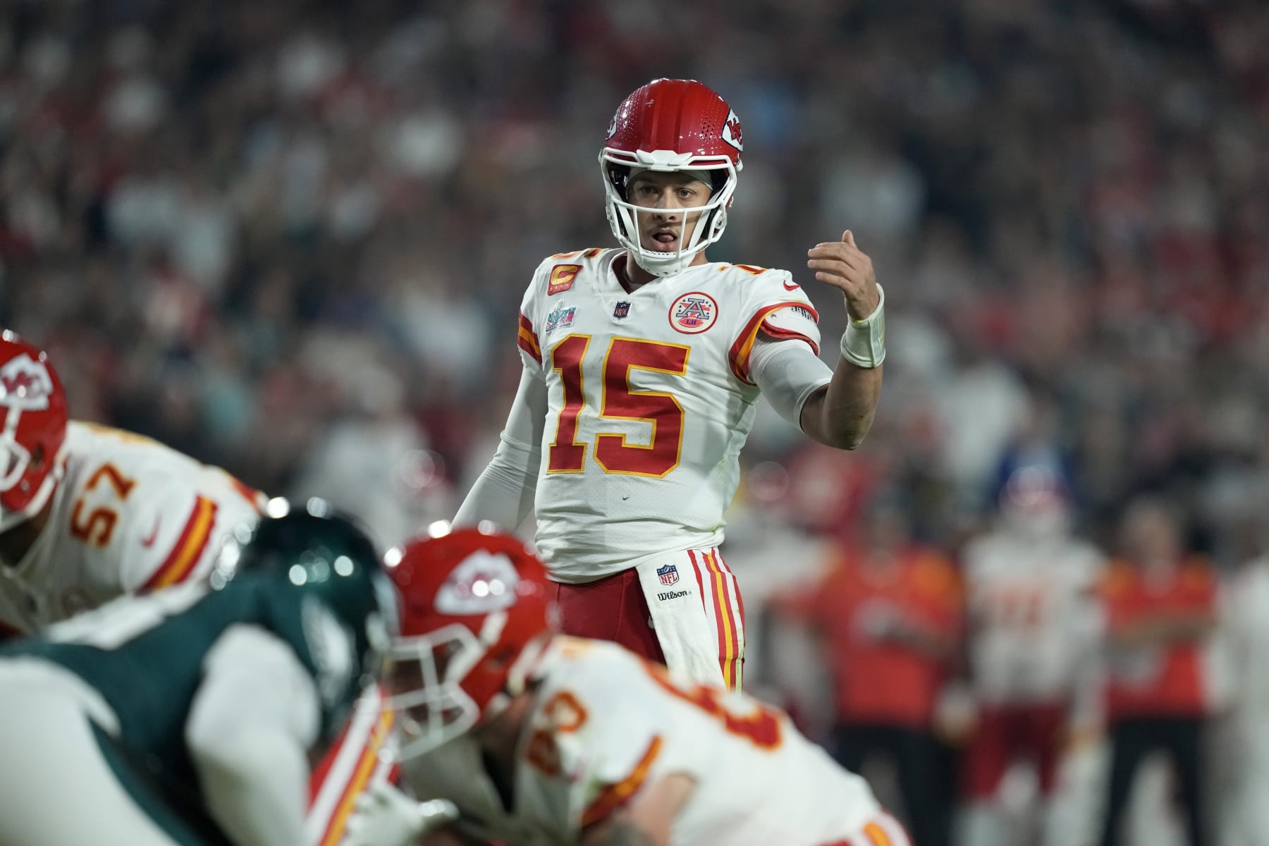 Kansas City Chiefs quarterback Patrick Mahomes (15) calls signals at the line of scrimmage against the Philadelphia Eagles during the NFL Super Bowl 57 football game, Sunday, Feb. 12, 2023, in Glendale, Ariz. (AP Photo/Steve Luciano)