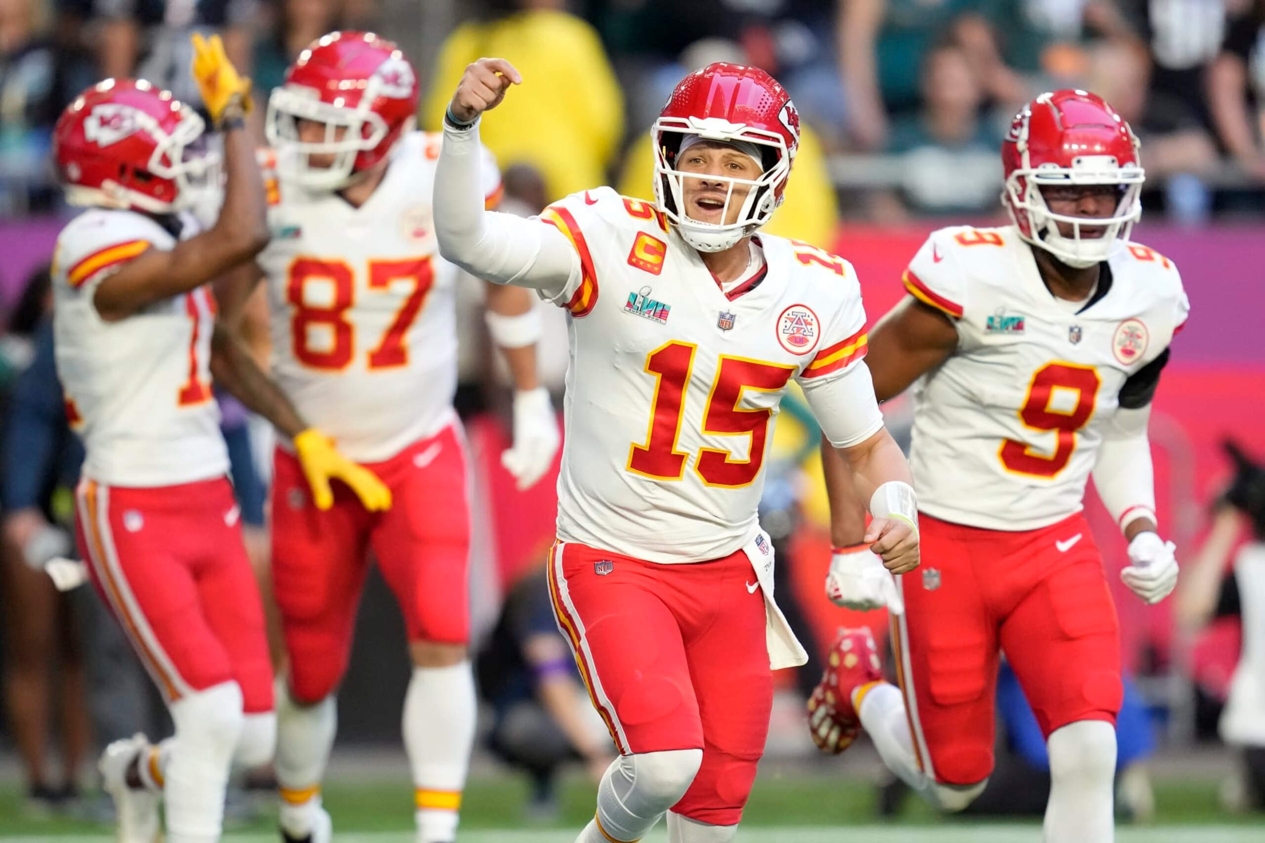 Kansas City Chiefs quarterback Patrick Mahomes (15) celebrates a touchdown against the Philadelphia Eagles during the first half of the NFL Super Bowl 57 football game between the Kansas City Chiefs and the Philadelphia Eagles, Sunday, Feb. 12, 2023, in Glendale, Ariz. (AP Photo/Ashley Landis)