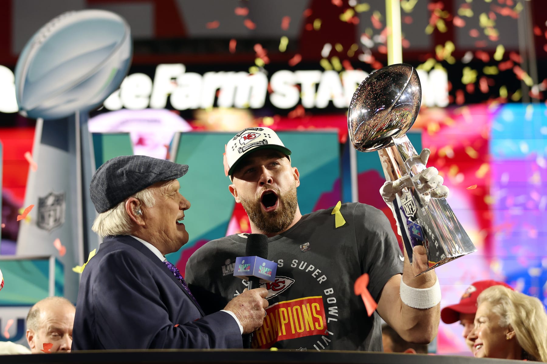 GLENDALE, ARIZONA - FEBRUARY 12: Travis Kelce #87 of the Kansas City Chiefs celebrates with the the Vince Lombardi Trophy after defeating the Philadelphia Eagles 38-35 in Super Bowl LVII at State Farm Stadium on February 12, 2023 in Glendale, Arizona. (Photo by Christian Petersen/Getty Images)