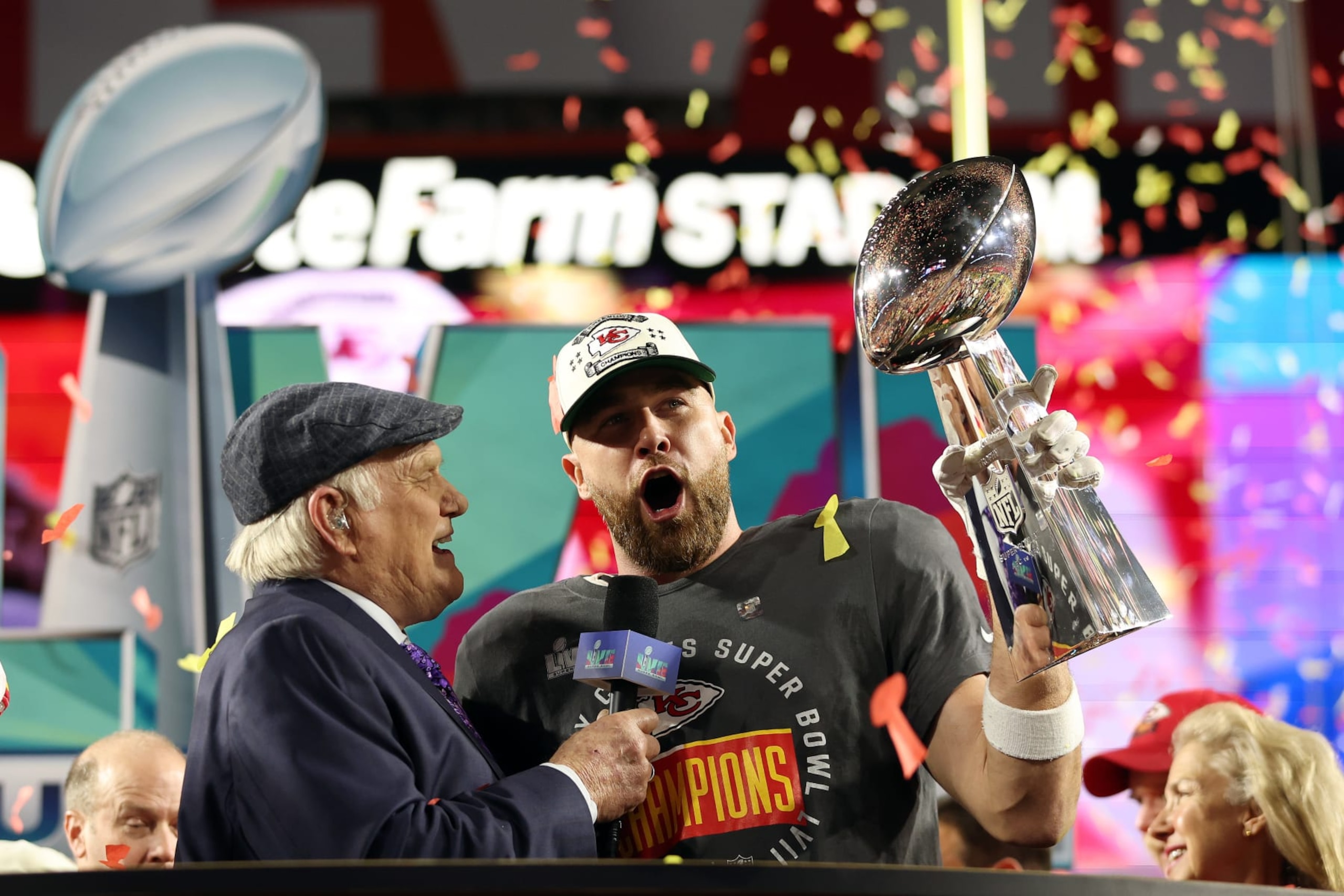 GLENDALE, ARIZONA - FEBRUARY 12: Travis Kelce #87 of the Kansas City Chiefs celebrates with the the Vince Lombardi Trophy after defeating the Philadelphia Eagles 38-35 in Super Bowl LVII at State Farm Stadium on February 12, 2023 in Glendale, Arizona. (Photo by Christian Petersen/Getty Images)