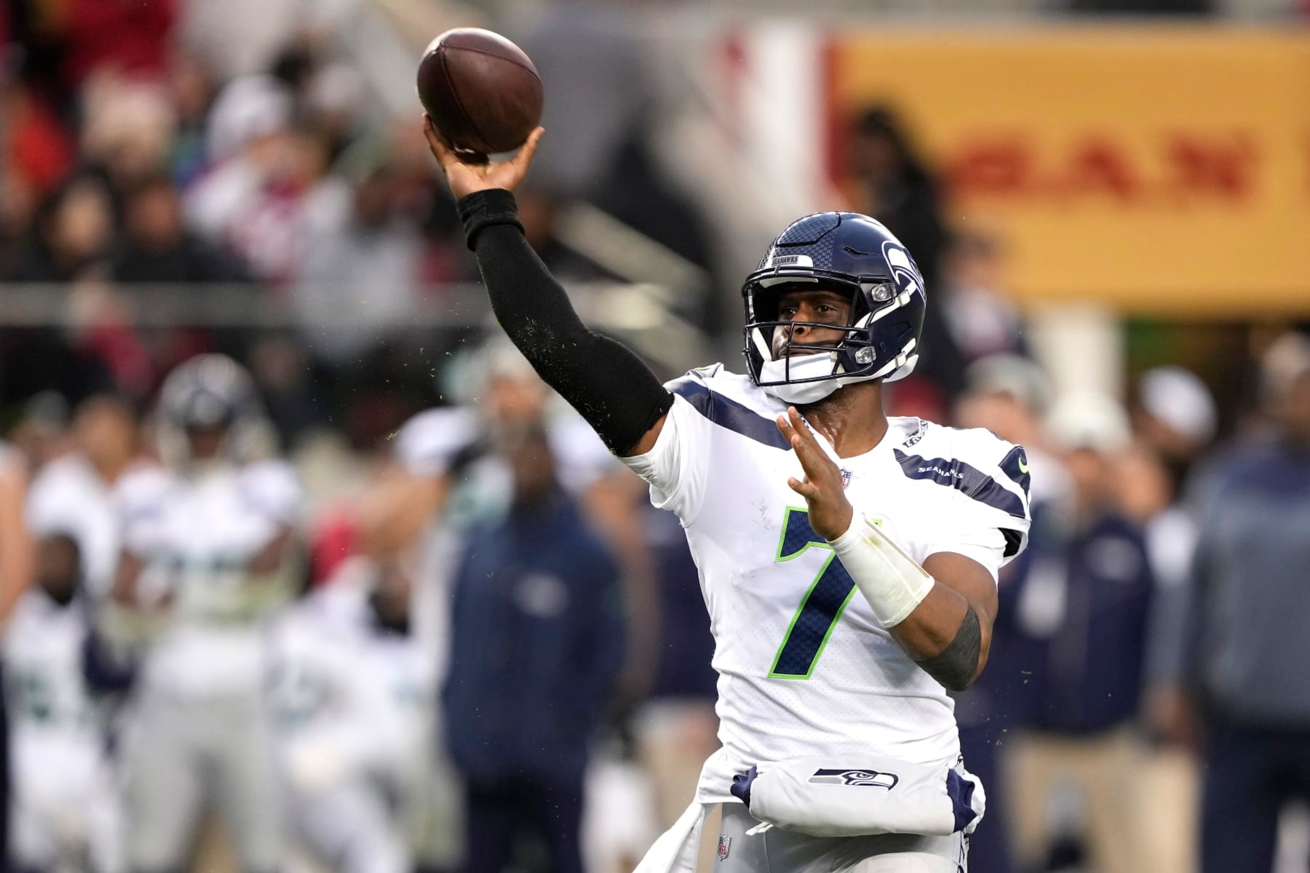 SANTA CLARA, CALIFORNIA - JANUARY 14: Geno Smith #7 of the Seattle Seahawks throws a pass against the San Francisco 49ers during the fourth quarter in the NFC Wild Card playoff game at Levi's Stadium on January 14, 2023 in Santa Clara, California. (Photo by Thearon W. Henderson/Getty Images)