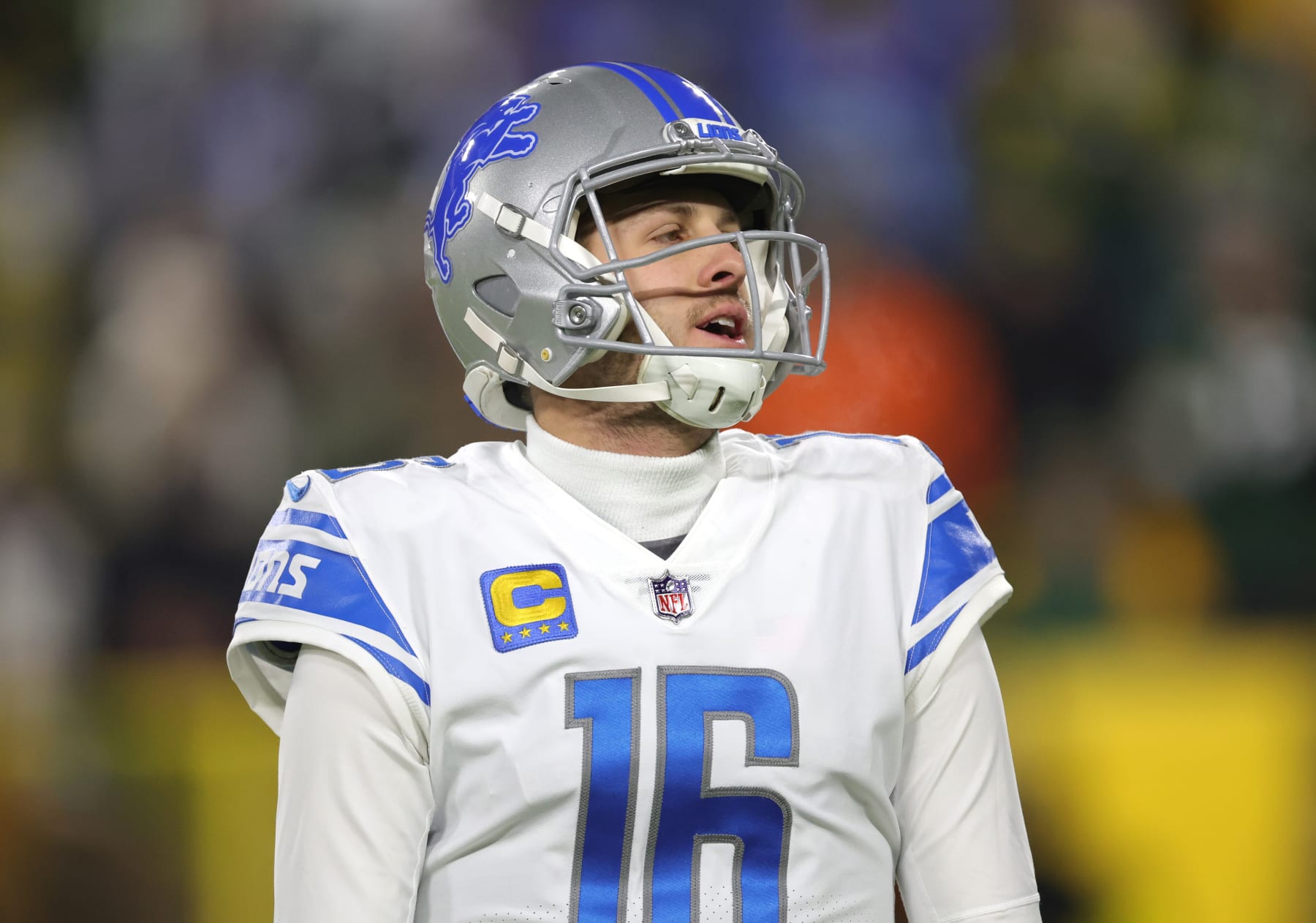 GREEN BAY, WISCONSIN - JANUARY 08: Jared Goff #16 of the Detroit Lions warms up prior to the game against the Green Bay Packers at Lambeau Field on January 08, 2023 in Green Bay, Wisconsin. (Photo by Stacy Revere/Getty Images)
