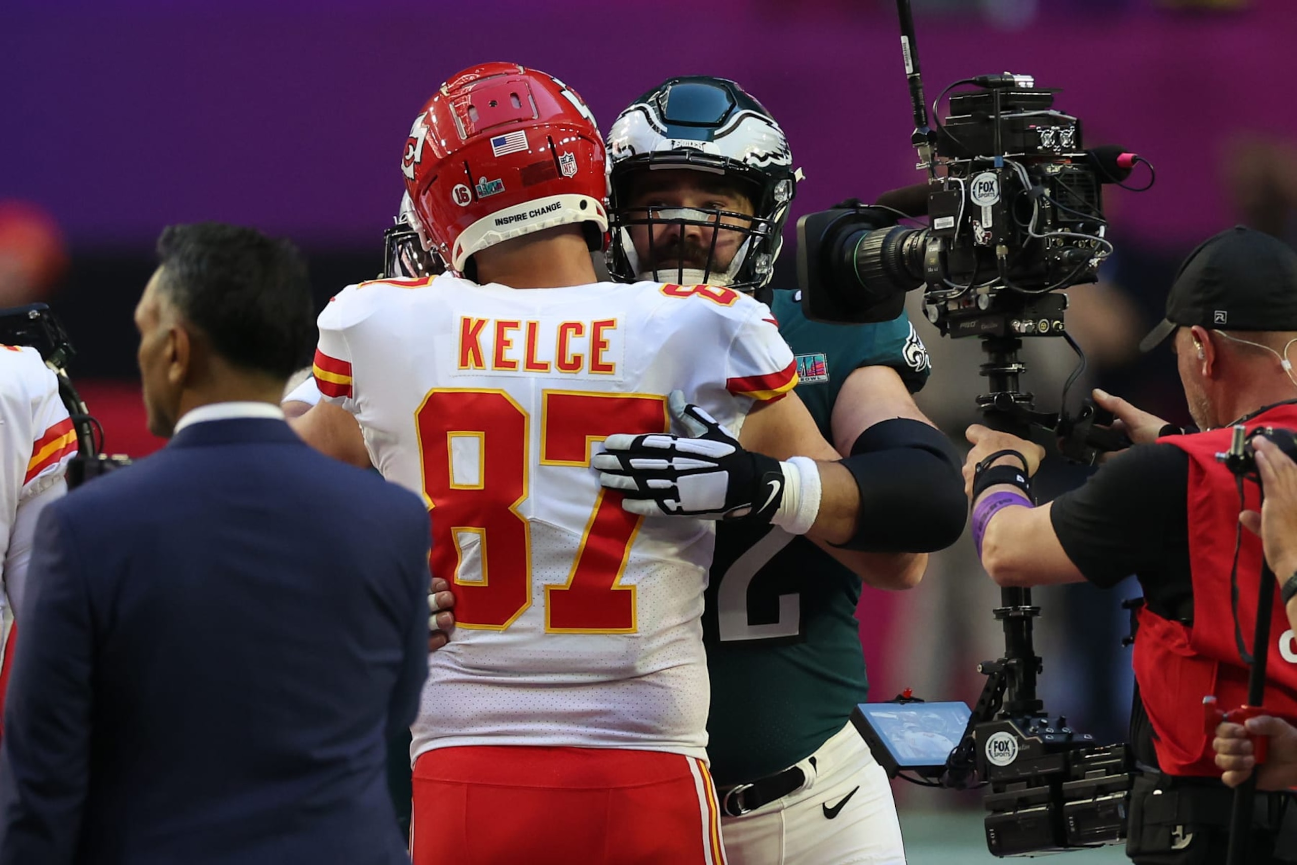 GLENDALE, ARIZONA - FEBRUARY 12: Travis Kelce #87 of the Kansas City Chiefs hugs Jason Kelce #62 of the Philadelphia Eagles before Super Bowl LVII at State Farm Stadium on February 12, 2023 in Glendale, Arizona. (Photo by Ezra Shaw/Getty Images) GLENDALE, ARIZONA - FEBRUARY 12: Travis Kelce #87 of the Kansas City Chiefs hugs Jason Kelce #62 of the Philadelphia Eagles before Super Bowl LVII at State Farm Stadium on February 12, 2023 in Glendale, Arizona. (Photo by Ezra Shaw/Getty Images)