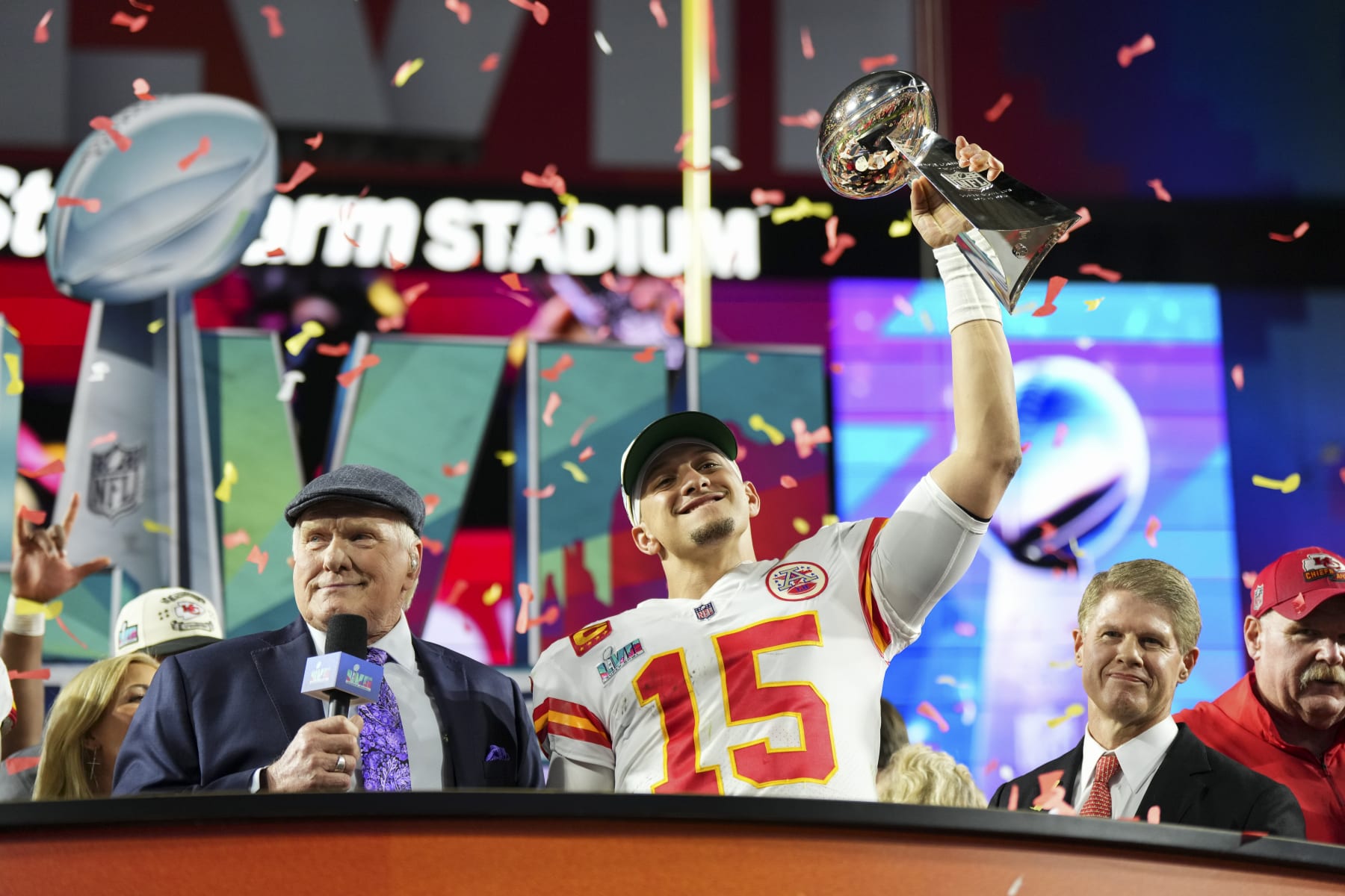 GLENDALE, AZ - FEBRUARY 12: Patrick Mahomes #15 of the Kansas City Chiefs hoists the Lombardi Trophy after Super Bowl LVII against the Philadelphia Eagles at State Farm Stadium on February 12, 2023 in Glendale, Arizona. The Chiefs defeated the Eagles 38-35. (Photo by Cooper Neill/Getty Images)