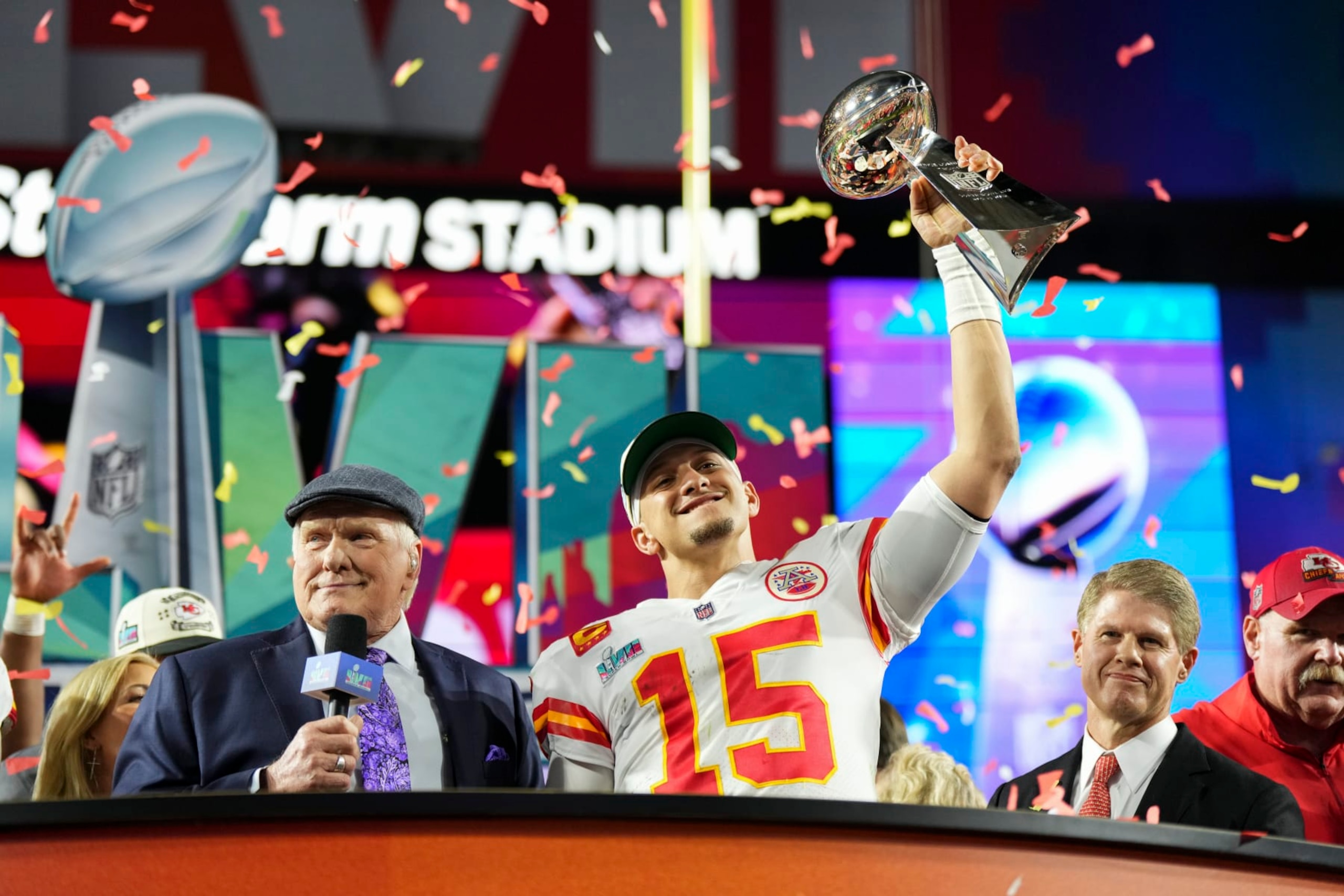 GLENDALE, AZ - FEBRUARY 12: Patrick Mahomes #15 of the Kansas City Chiefs hoists the Lombardi Trophy after Super Bowl LVII against the Philadelphia Eagles at State Farm Stadium on February 12, 2023 in Glendale, Arizona. The Chiefs defeated the Eagles 38-35. (Photo by Cooper Neill/Getty Images)