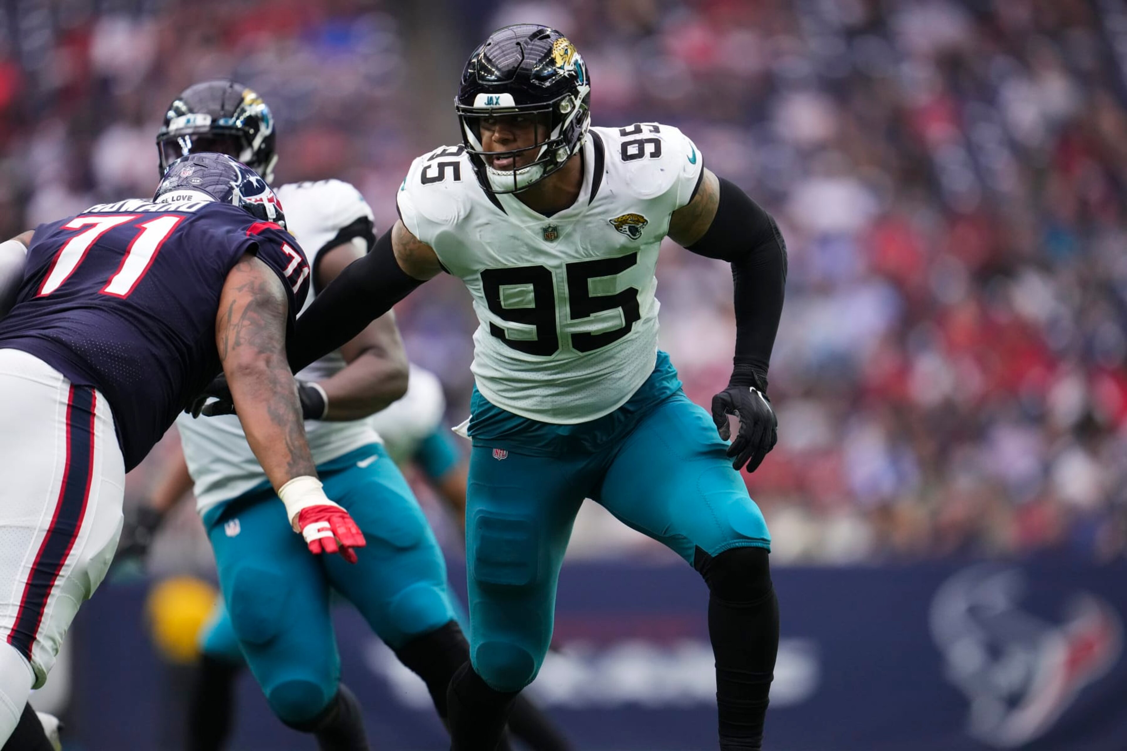 HOUSTON, TX - JANUARY 01: Roy Robertson-Harris #95 of the Jacksonville Jaguars defends against the Houston Texans at NRG Stadium on January 1, 2023 in Houston, Texas. (Photo by Cooper Neill/Getty Images) HOUSTON, TX - JANUARY 01: Roy Robertson-Harris #95 of the Jacksonville Jaguars defends against the Houston Texans at NRG Stadium on January 1, 2023 in Houston, Texas. (Photo by Cooper Neill/Getty Images)