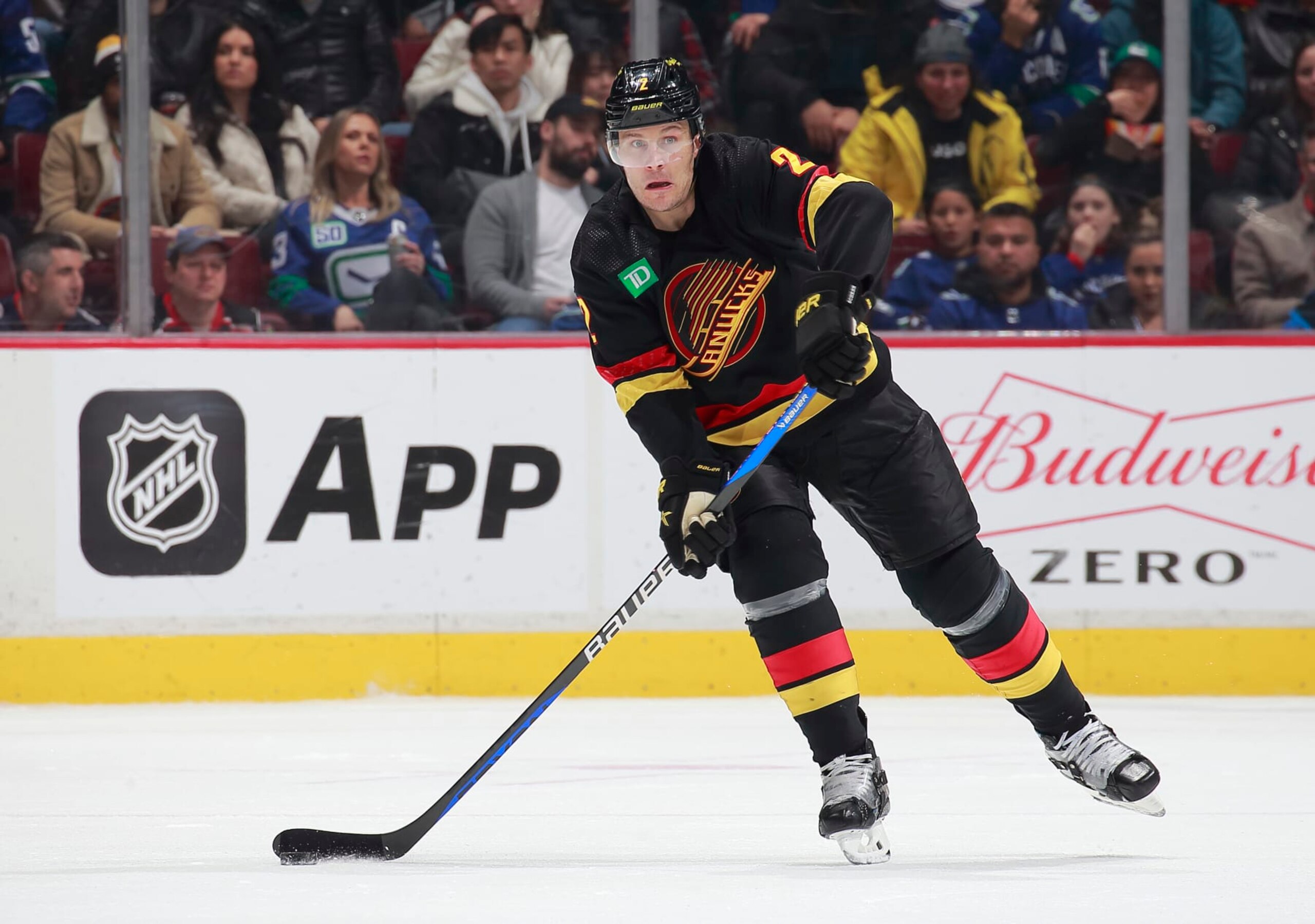 VANCOUVER, CANADA - JANUARY 27: Luke Schenn #2 of the Vancouver Canucks skates up ice during their NHL game against the Columbus Blue Jackets at Rogers Arena January 27, 2023 in Vancouver, British Columbia, Canada.  (Photo by Jeff Vinnick/NHLI via Getty Images)