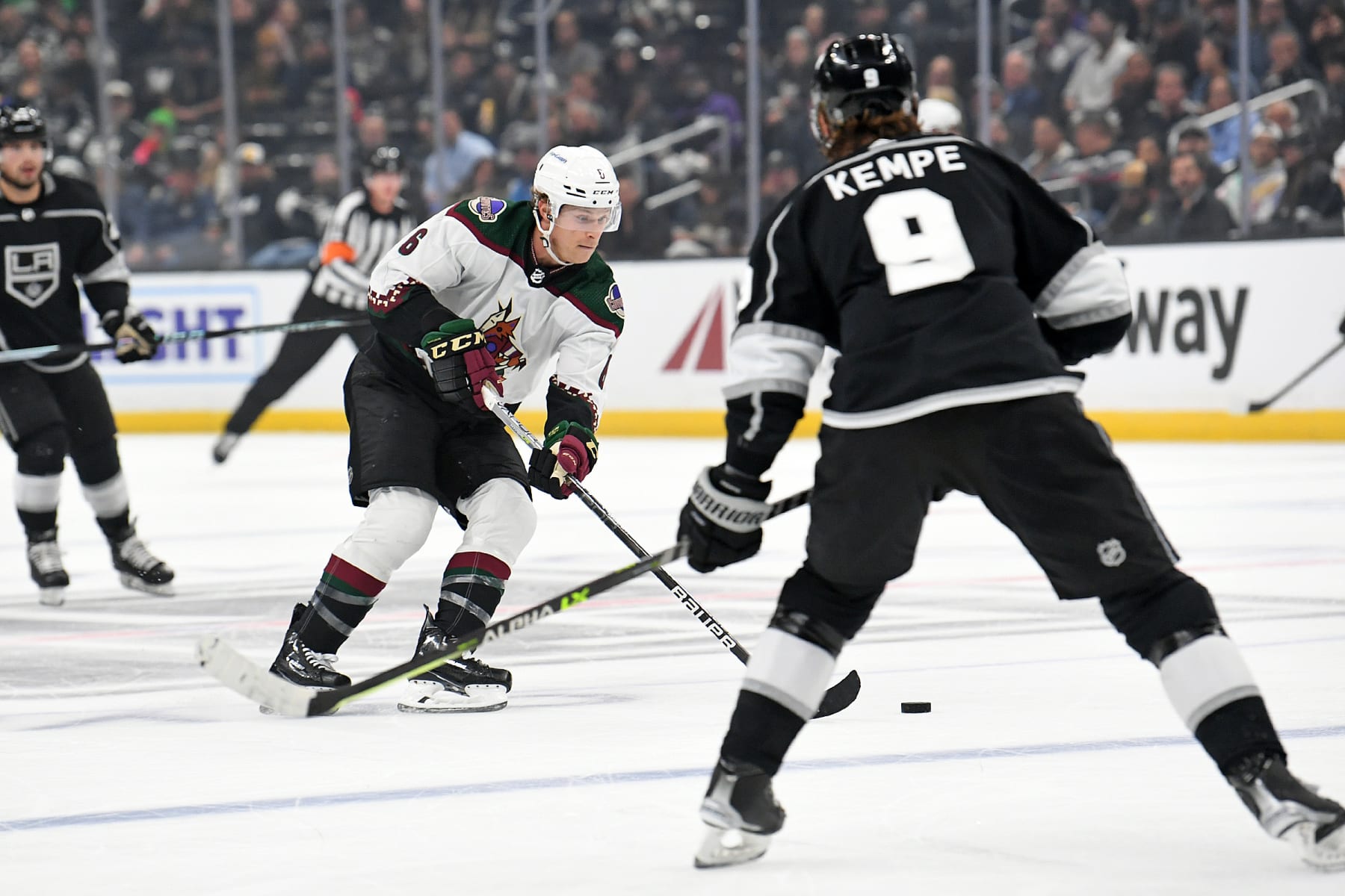 LOS ANGELES, CA - DECEMBER 01: Arizona Coyotes Defenceman Jakob Chychrun (6) carries the puck as Los Angeles Kings Left Wing Adrian Kempe (9) looks on during an NHL game between the Arizona Coyotes and the Los Angeles Kings on December 1st, 2022, at the Crypto.com Arena in Los Angeles, CA.  (Photo by Rob Curtis/Icon Sportswire via Getty Images)