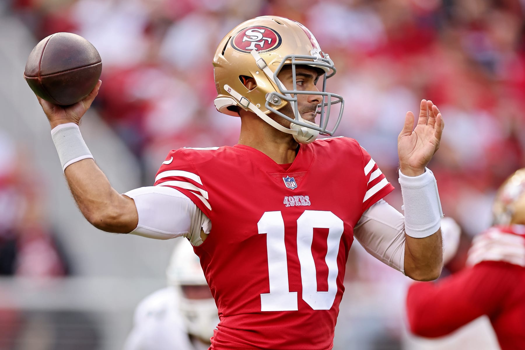 SANTA CLARA, CALIFORNIA - DECEMBER 04: Jimmy Garoppolo #10 of the San Francisco 49ers attempts a pass during the first quarter against the Miami Dolphins at Levi's Stadium on December 04, 2022 in Santa Clara, California. (Photo by Ezra Shaw/Getty Images)