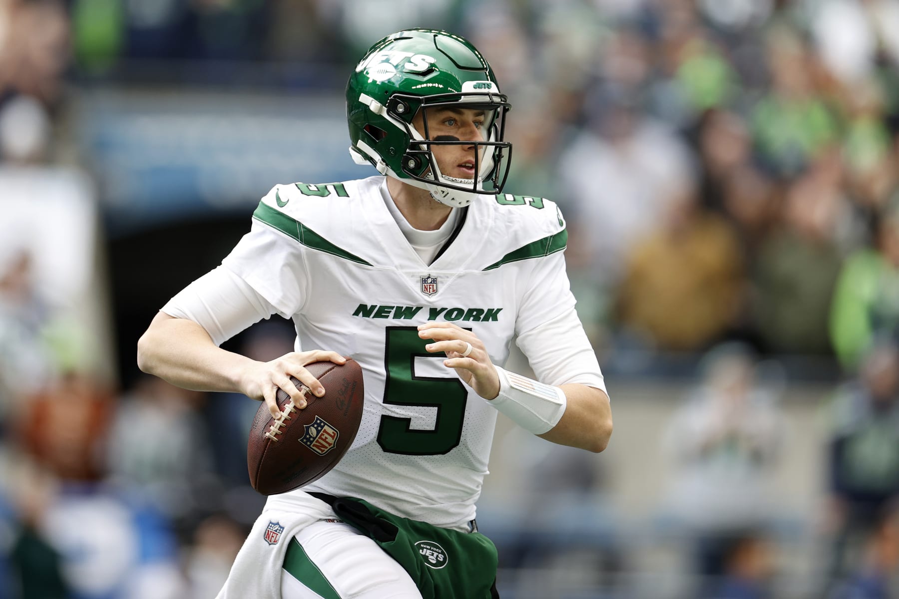 SEATTLE, WASHINGTON - JANUARY 01: Mike White #5 of the New York Jets looks to pass during the first quarter against the Seattle Seahawks at Lumen Field on January 01, 2023 in Seattle, Washington. (Photo by Steph Chambers/Getty Images)