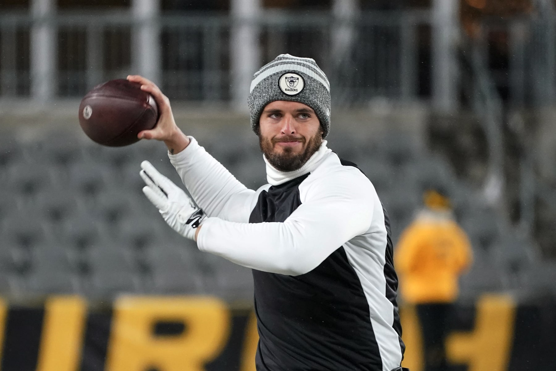 Las Vegas Raiders quarterback Derek Carr warms up before an NFL football game against the Pittsburgh Steelers in Pittsburgh, Saturday, Dec. 24, 2022. (AP Photo/Gene J. Puskar)