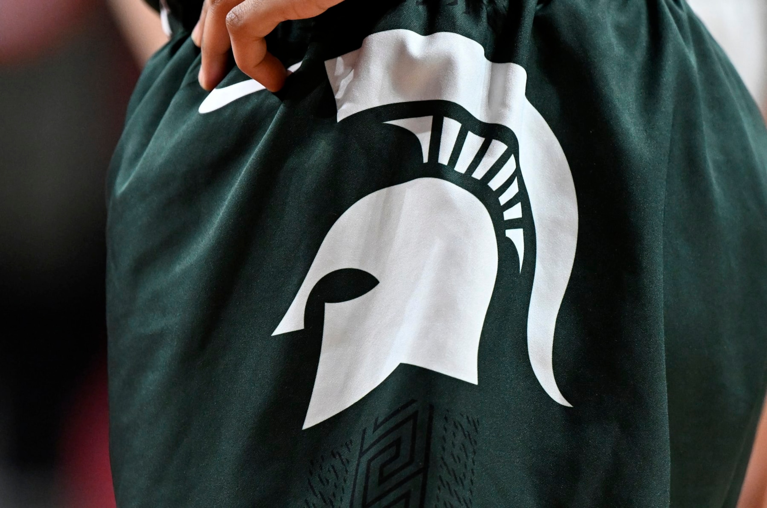 COLLEGE PARK, MARYLAND - JANUARY 07: A view of the Michigan State Spartans logo on their uniform during the game against the Maryland Terrapins at Xfinity Center on January 07, 2023 in College Park, Maryland. (Photo by G Fiume/Getty Images) COLLEGE PARK, MARYLAND - JANUARY 07: A view of the Michigan State Spartans logo on their uniform during the game against the Maryland Terrapins at Xfinity Center on January 07, 2023 in College Park, Maryland. (Photo by G Fiume/Getty Images)