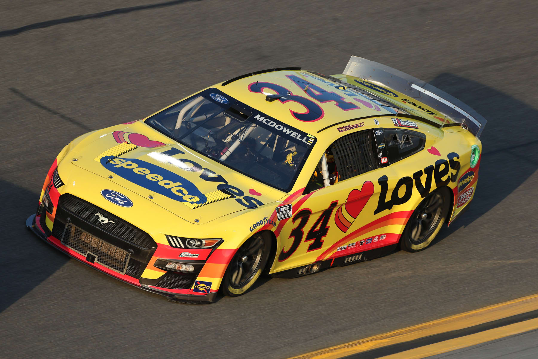 DAYTONA, FL - FEBRUARY 18: Michael McDowell (#34 Front Row Motorsports Love's Travel Stops Ford) during practice for the NASCAR Cup Series Daytona 500 on February 18, 2022 at Daytona International Speedway in Daytona Beach, FL.(Photo by Jeff Robinson/Icon Sportswire via Getty Images)