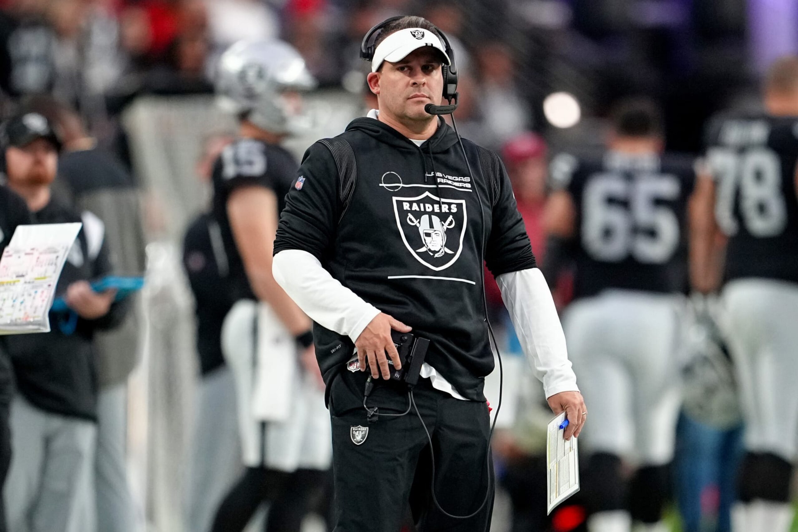 LAS VEGAS, NEVADA - JANUARY 07: Head coach Josh McDaniels of the Las Vegas Raiders looks on against the Kansas City Chiefs during the first half of the game at Allegiant Stadium on January 07, 2023 in Las Vegas, Nevada. (Photo by Jeff Bottari/Getty Images) LAS VEGAS, NEVADA - JANUARY 07: Head coach Josh McDaniels of the Las Vegas Raiders looks on against the Kansas City Chiefs during the first half of the game at Allegiant Stadium on January 07, 2023 in Las Vegas, Nevada. (Photo by Jeff Bottari/Getty Images)