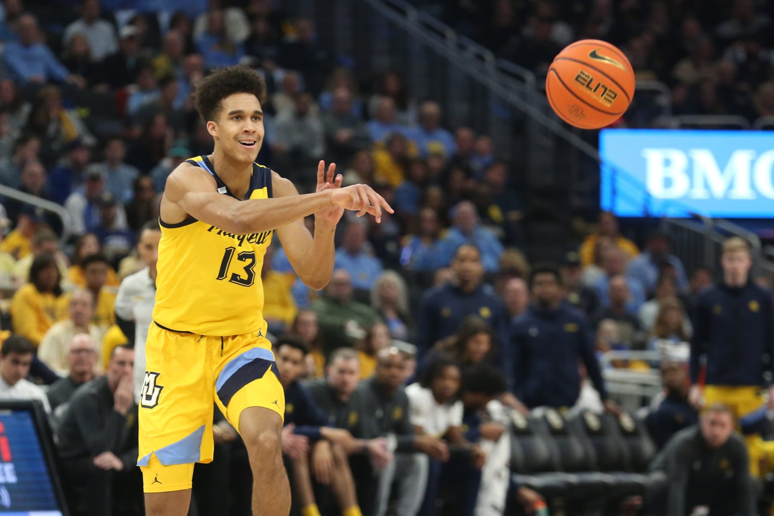 MILWAUKEE, WI - FEBRUARY 04: Marquette Golden Eagles forward Oso Ighodaro (13) passes the ball during a game between the Marquette Golden Eagles and the Butler Bulldogs on February 4, 2023 at Fiserv Forum in Milwaukee, WI. (Photo by Larry Radloff/Icon Sportswire via Getty Images)