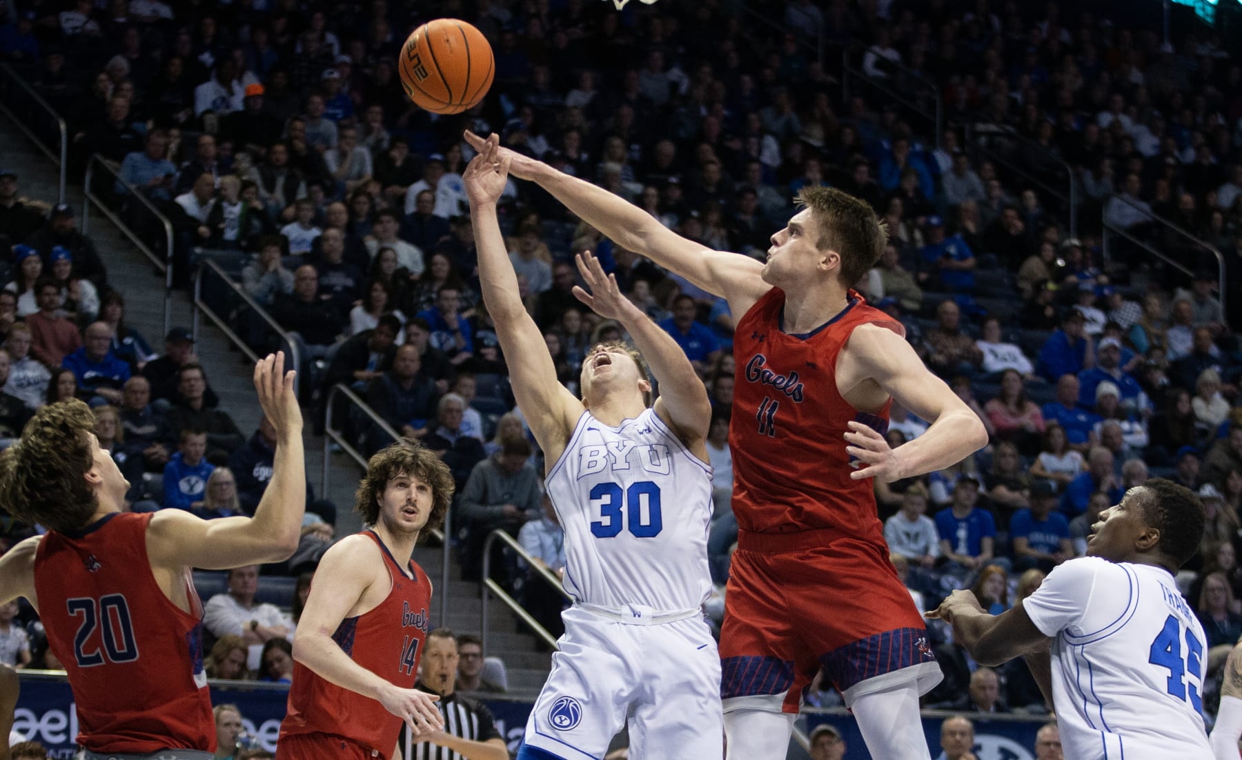 PROVO, UT- JANUARY 28:  Mitchell Saxen #11 of the Saint Marys Gaels blocks a shot by Dallin Hall #30 of the Brigham Young Cougars during the second half of their game January 28, 2023 at the Marriott Center in Provo, Utah.(Photo by Chris Gardner/Getty Images)