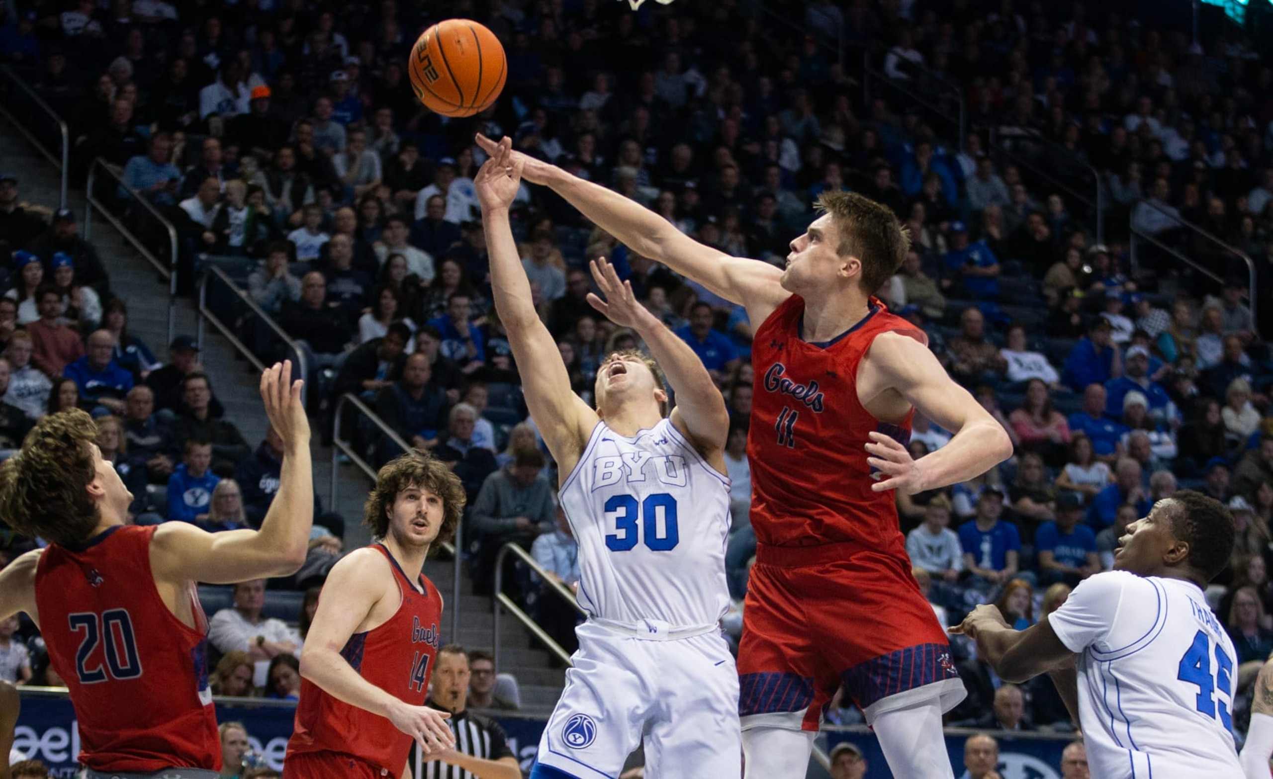 PROVO, UT- JANUARY 28:  Mitchell Saxen #11 of the Saint Marys Gaels blocks a shot by Dallin Hall #30 of the Brigham Young Cougars during the second half of their game January 28, 2023 at the Marriott Center in Provo, Utah.(Photo by Chris Gardner/Getty Images)