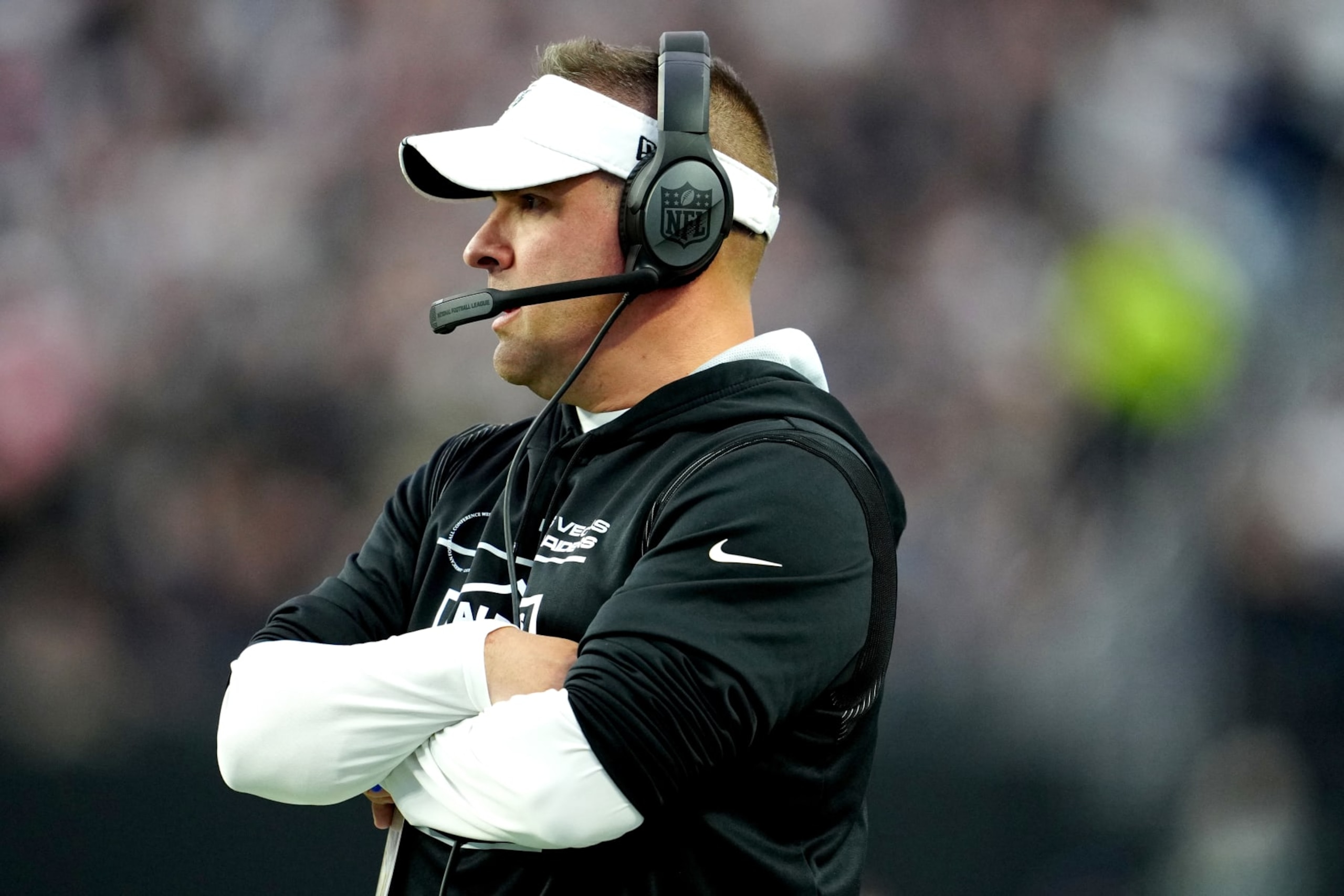 LAS VEGAS, NEVADA - DECEMBER 18: Head coach Josh McDaniels of the Las Vegas Raiders look on against the New England Patriots during the first half of the game at Allegiant Stadium on December 18, 2022 in Las Vegas, Nevada. (Photo by Jeff Bottari/Getty Images)