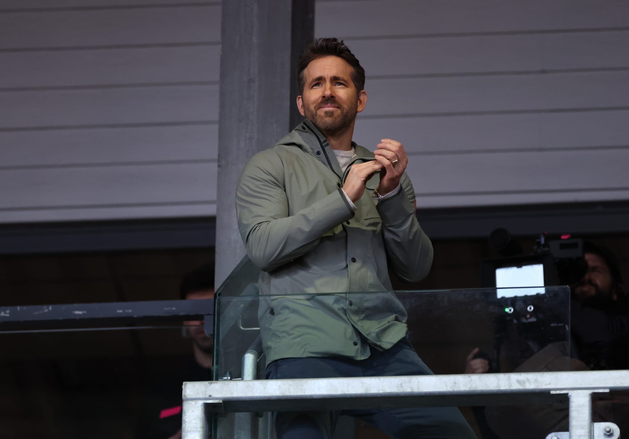 WREXHAM, WALES - JANUARY 29: Ryan Reynolds the owner of Wrexham looks on during the Emirates FA Cup Fourth Round match between Wrexham and Sheffield United at Racecourse Ground on January 29, 2023 in Wrexham, Wales. (Photo by Alex Livesey - Danehouse/Getty Images) WREXHAM, WALES - JANUARY 29: Ryan Reynolds the owner of Wrexham looks on during the Emirates FA Cup Fourth Round match between Wrexham and Sheffield United at Racecourse Ground on January 29, 2023 in Wrexham, Wales. (Photo by Alex Livesey - Danehouse/Getty Images)
