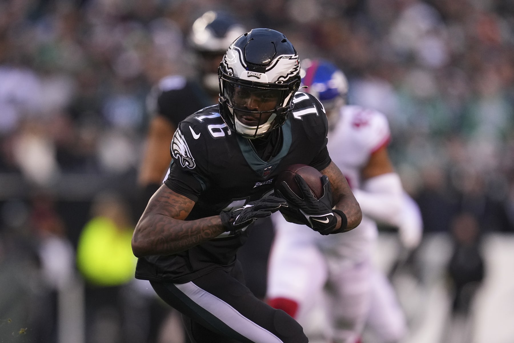 PHILADELPHIA, PA - JANUARY 08: Quez Watkins #16 of the Philadelphia Eagles runs with the ball against the New York Giants at Lincoln Financial Field on January 8, 2023 in Philadelphia, Pennsylvania. (Photo by Mitchell Leff/Getty Images)
