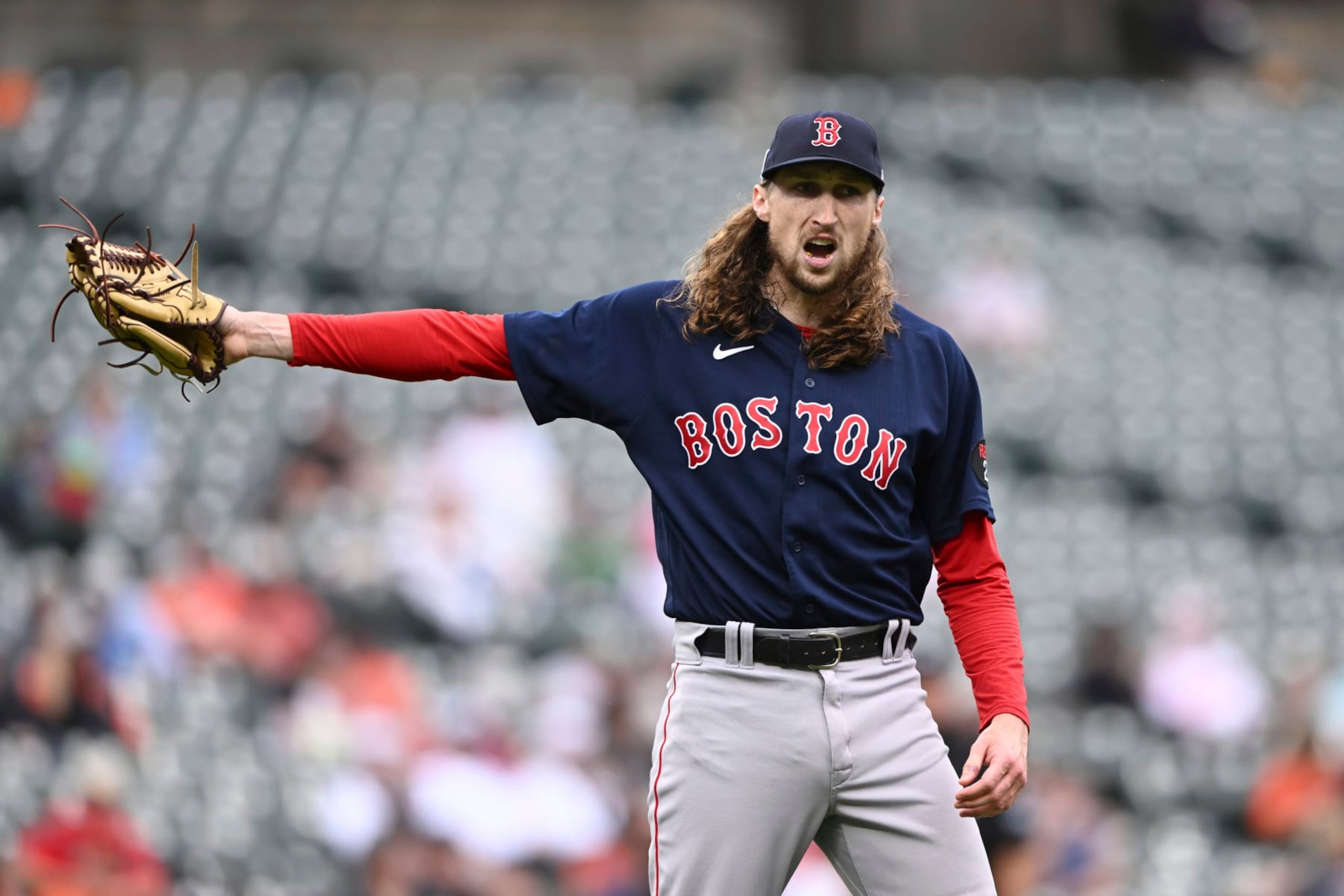 Boston Red Sox pitcher Matt Strahm reacts after being called on a balk in the seventh inning of a baseball game against the Baltimore Orioles, Sunday, Sept. 11, 2022, in Baltimore. (AP Photo/Gail Burton)