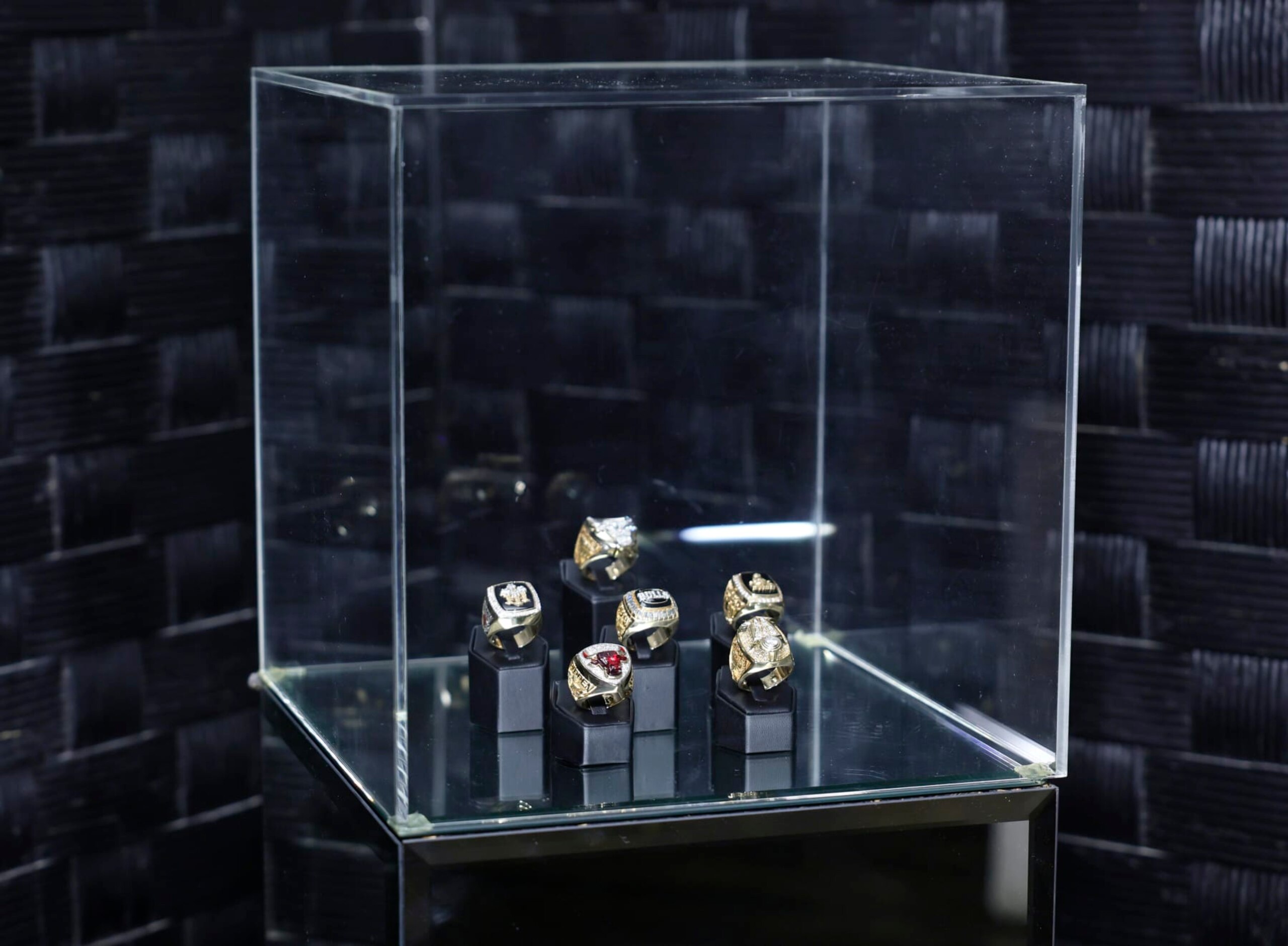HOLLYWOOD, CALIFORNIA - OCTOBER 25: Championship rings are on display during the Neiman Marcus debut of their 2022 holiday campaign and unveiling of fantasy gifts at Hollywood Athletic Club on October 25, 2022 in Hollywood, California. (Photo by Stefanie Keenan/Getty Images for Neiman Marcus)