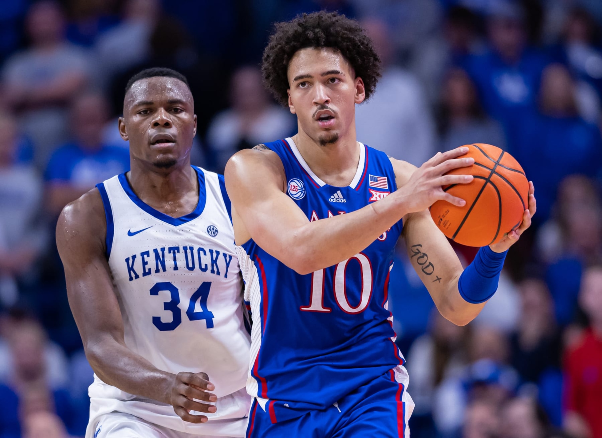 Kansas' Jalen Wilson and Kentucky's Oscar Tshiebwe