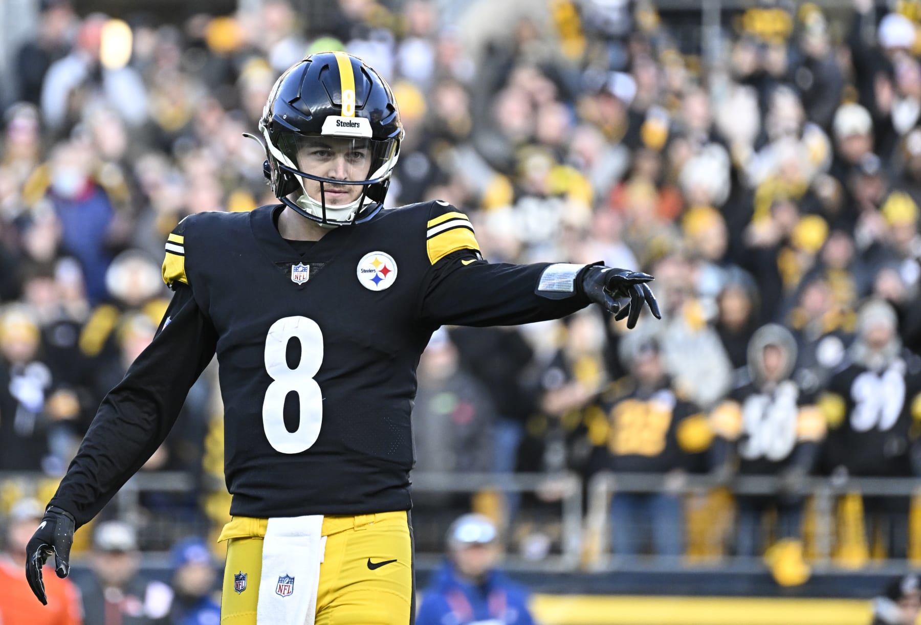 PITTSBURGH, PA - JANUARY 08:   Pittsburgh Steelers quarterback Kenny Pickett (8) points to a flag on the field during the game between the Pittsburgh Steelers and the Cleveland Browns at Acrisure Stadium on January 8, 2023 in Pittsburgh, PA. (Photo by Shelley Lipton/Icon Sportswire via Getty Images)