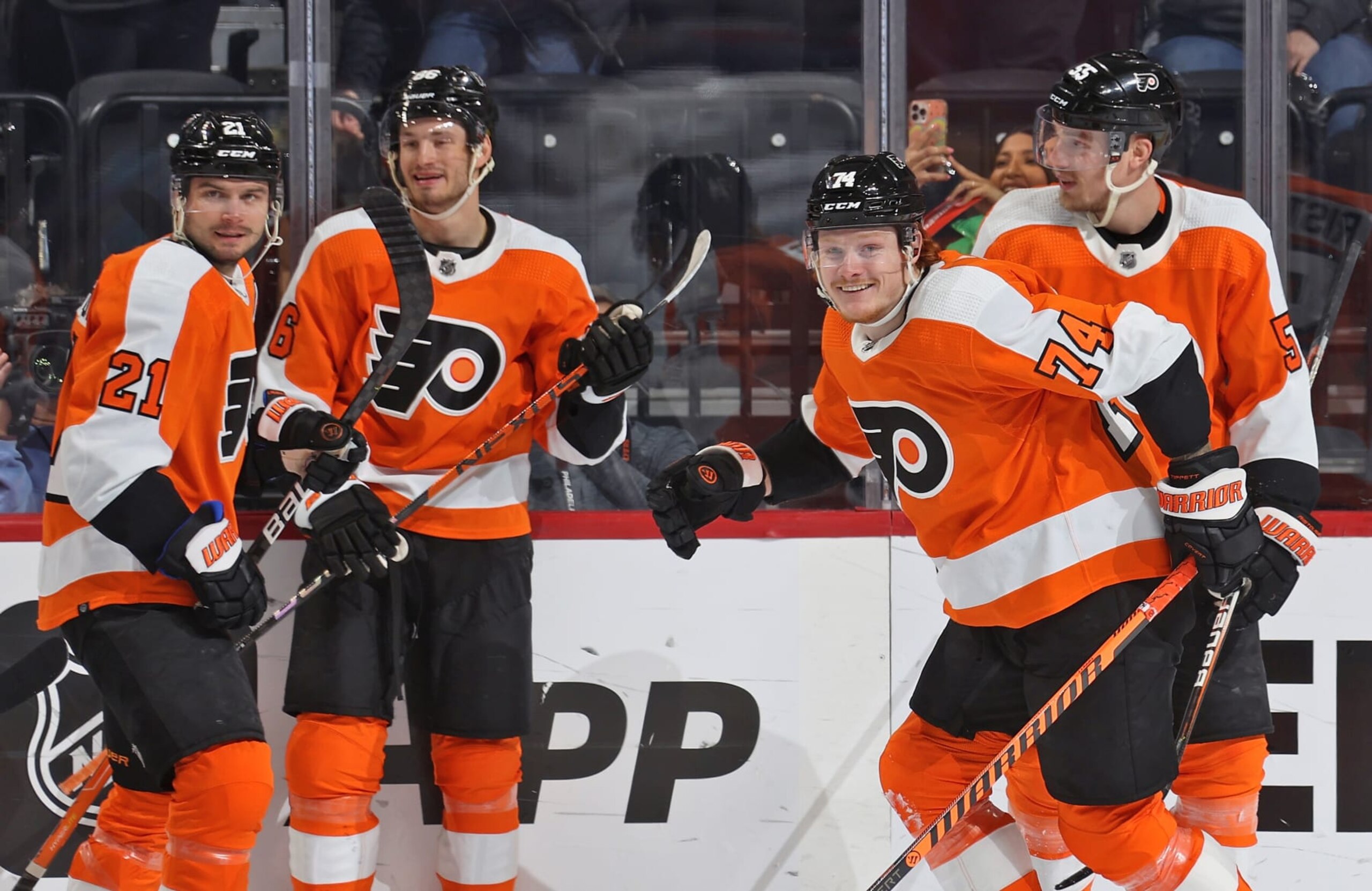 PHILADELPHIA, PENNSYLVANIA - FEBRUARY 12: Owen Tippett #74 of the Philadelphia Flyers celebrates his first period power-play goal against the Seattle Kraken with Scott Laughton #21, Joel Farabee #86, adn Rasmus Ristolainen #55 at the Wells Fargo Center on February 12, 2023 in Philadelphia, Pennsylvania.  (Photo by Len Redkoles/NHLI via Getty Images)