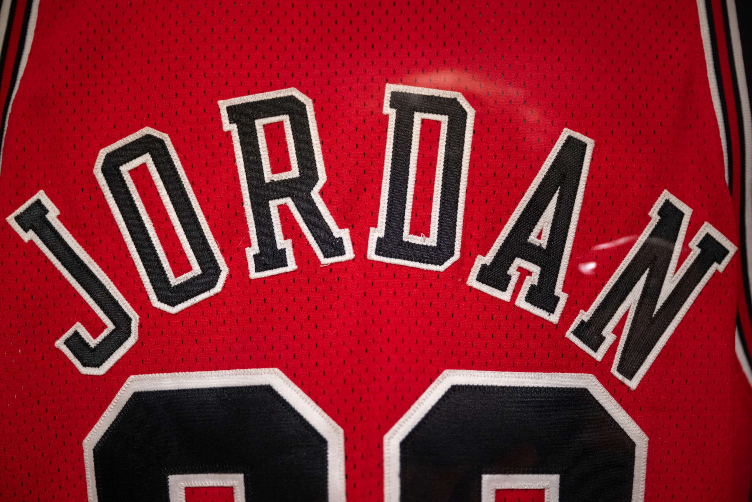 NEW YORK, NEW YORK - SEPTEMBER 06: A close up of Michael Jordan’s game-worn 1998 NBA Finals ‘The Last Dance’ jersey from game 1 is on display during a press preview at Sotheby's on September 06, 2022 in New York City. The jersey is expected to achieve $3-5 million â¨during the Invictus sports auction which will be held from September 6-14. (Photo by Alexi Rosenfeld/Getty Images)