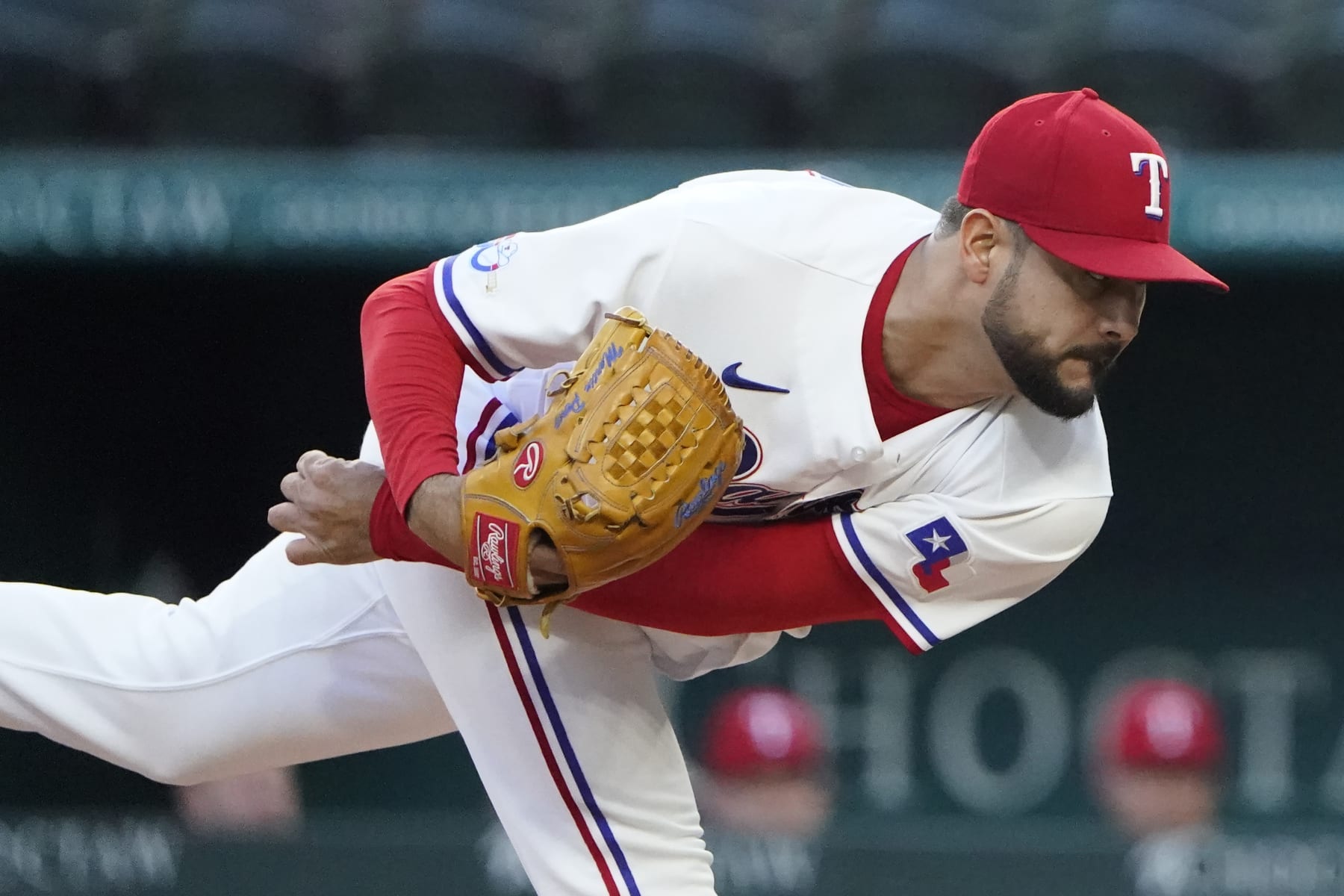 Texas Rangers starting pitcher Martin Perez follows through during the first inning of a baseball game against the New York Yankees in Arlington, Texas, Monday, Oct. 3, 2022. (AP Photo/LM Otero)