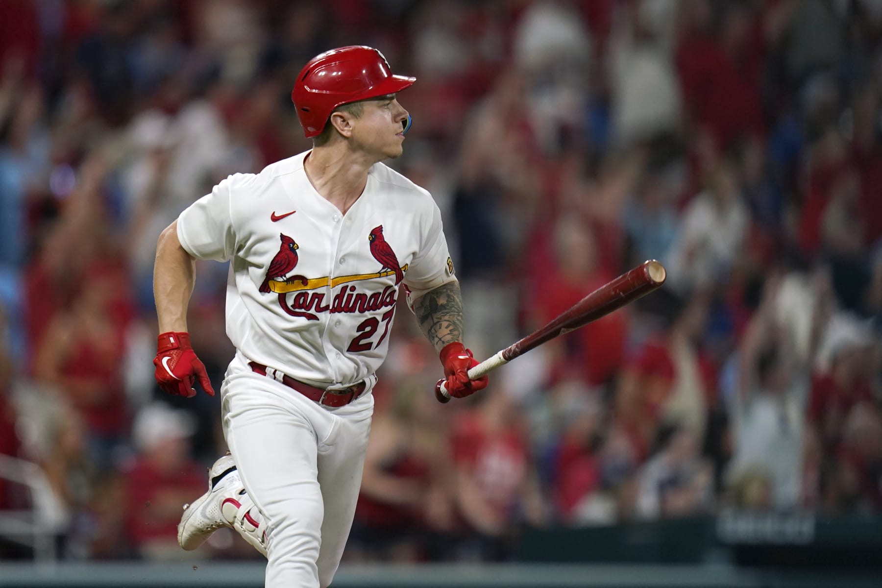 St. Louis Cardinals' Tyler O'Neill watches his three-run home run during the seventh inning in the second game of a baseball against the Chicago Cubs doubleheader Thursday, Aug. 4, 2022, in St. Louis. (AP Photo/Jeff Roberson)