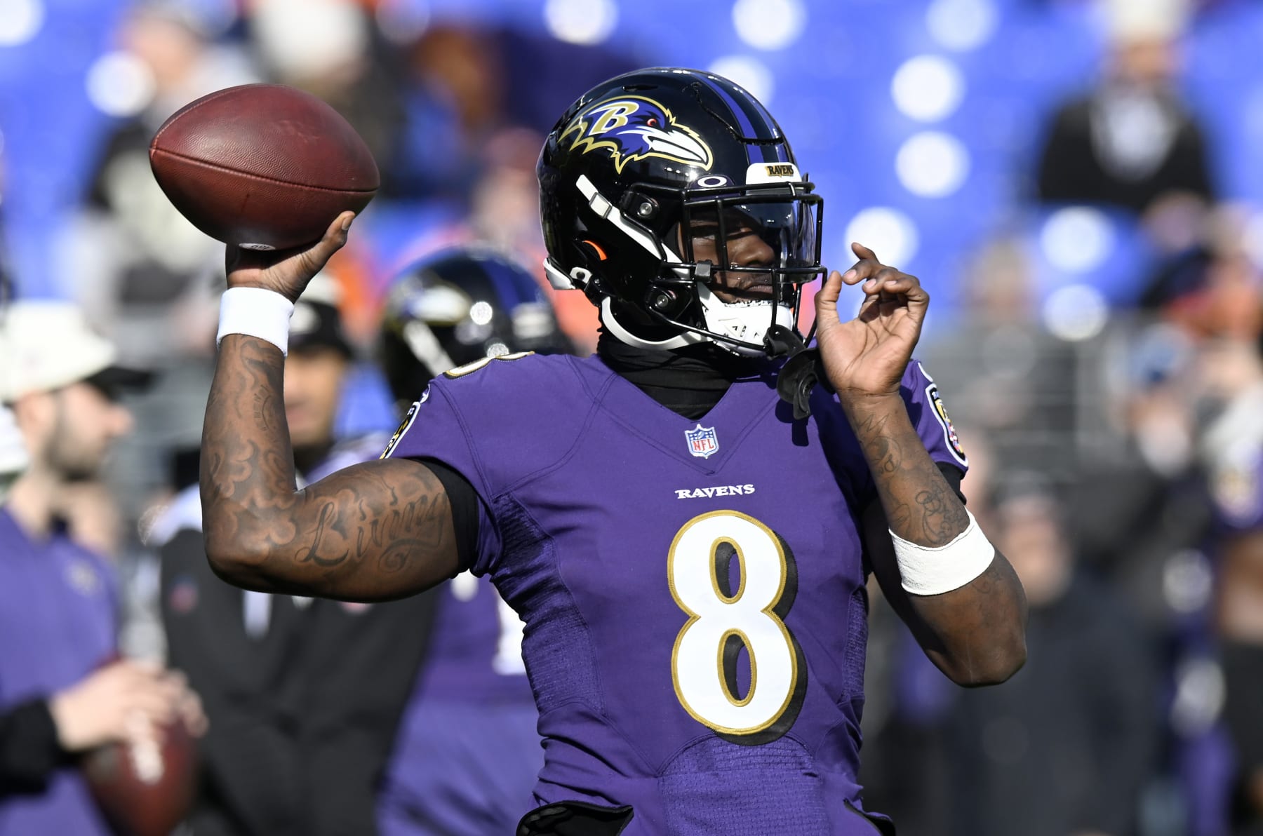 BALTIMORE, MARYLAND - DECEMBER 04: Lamar Jackson #8 of the Baltimore Ravens warms up before the game against the Denver Broncos at M&T Bank Stadium on December 04, 2022 in Baltimore, Maryland. (Photo by G Fiume/Getty Images)